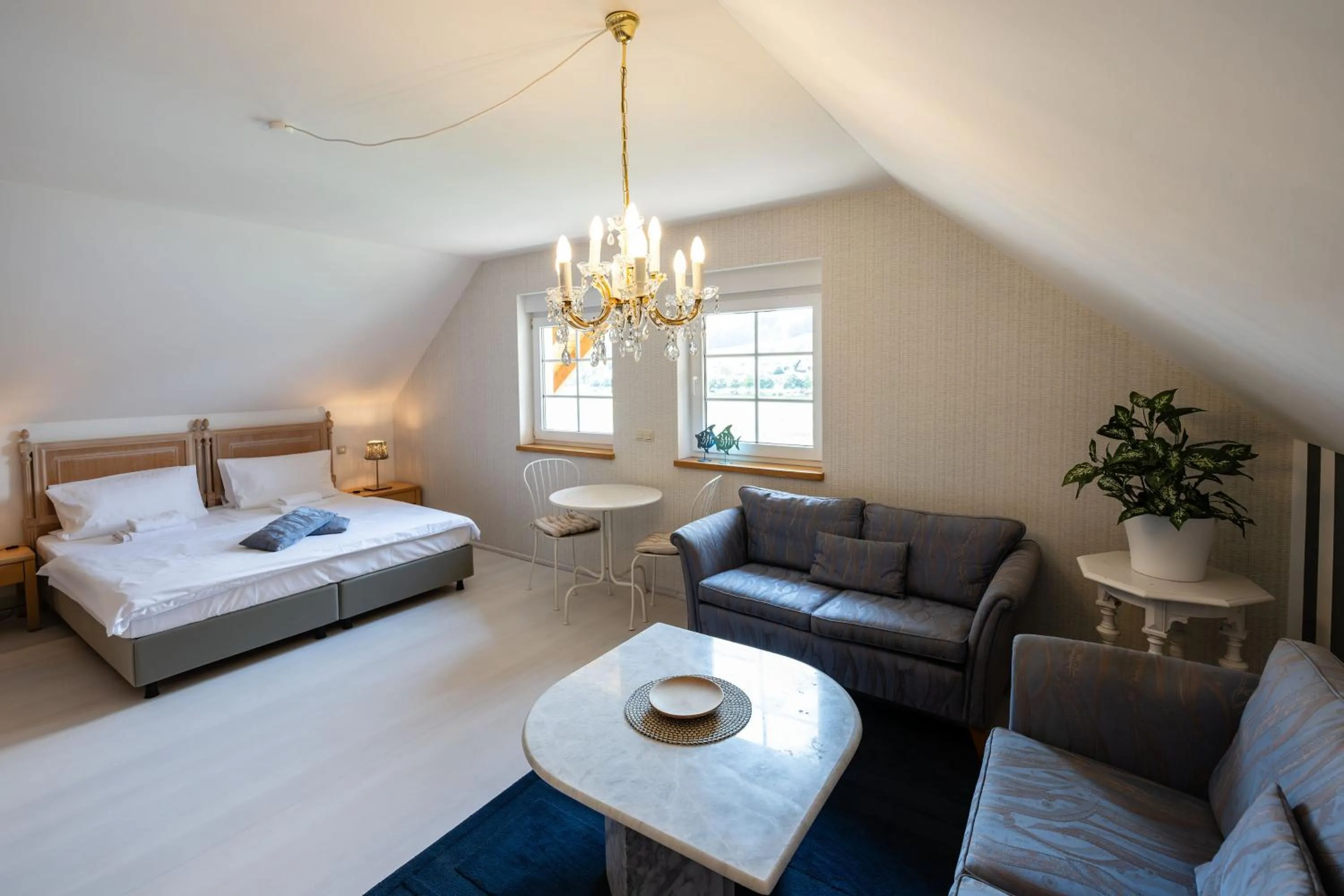 Living room, Bed in Rathener Hof by STEIGER Hotels