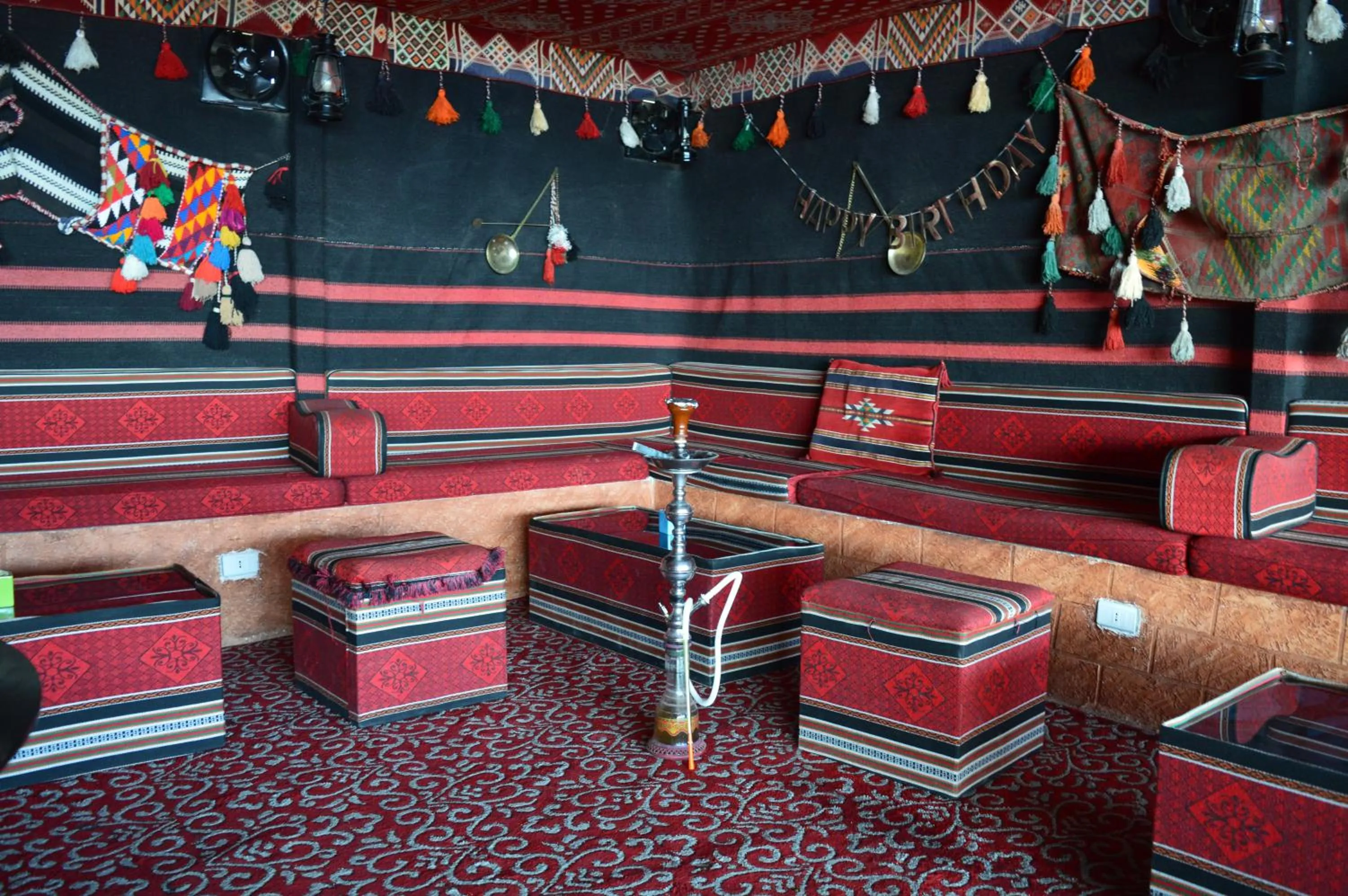 Communal lounge/ TV room in Rafiki Hostel