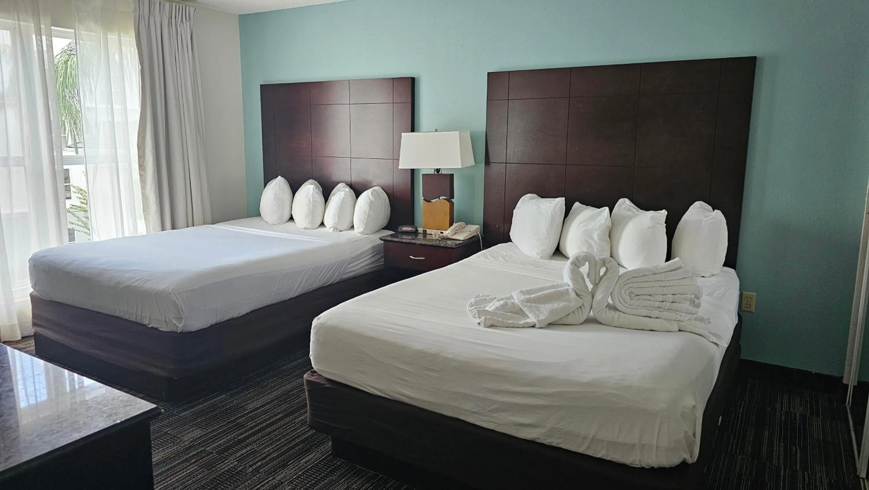 Bedroom in SureStay Plus by Best Western Orlando Lake Buena Vista