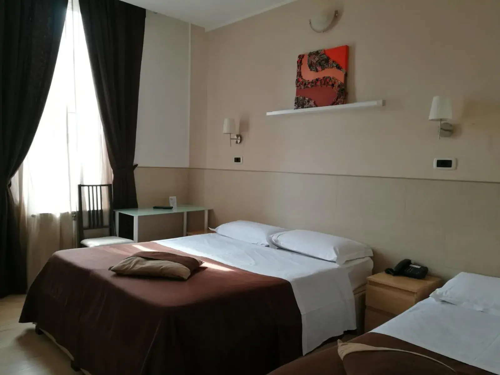 Bed in Hotel Indipendenza Bed in Hotel Indipendenza