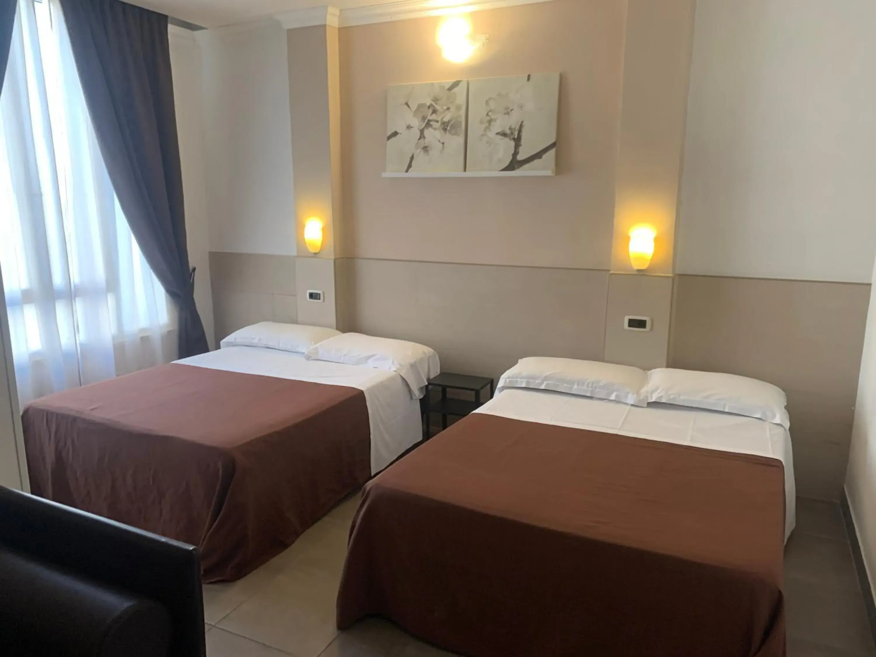 View (from property/room), Bed in Hotel Indipendenza View (from property/room), Bed in Hotel Indipendenza