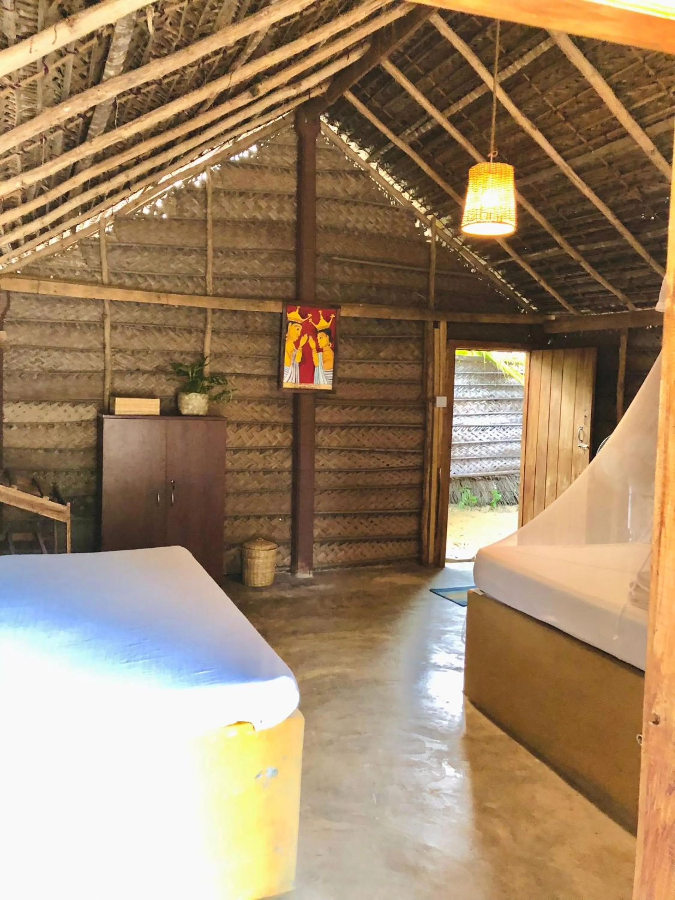 Bed in Windy Waves Beach Nature Resort & Kite School