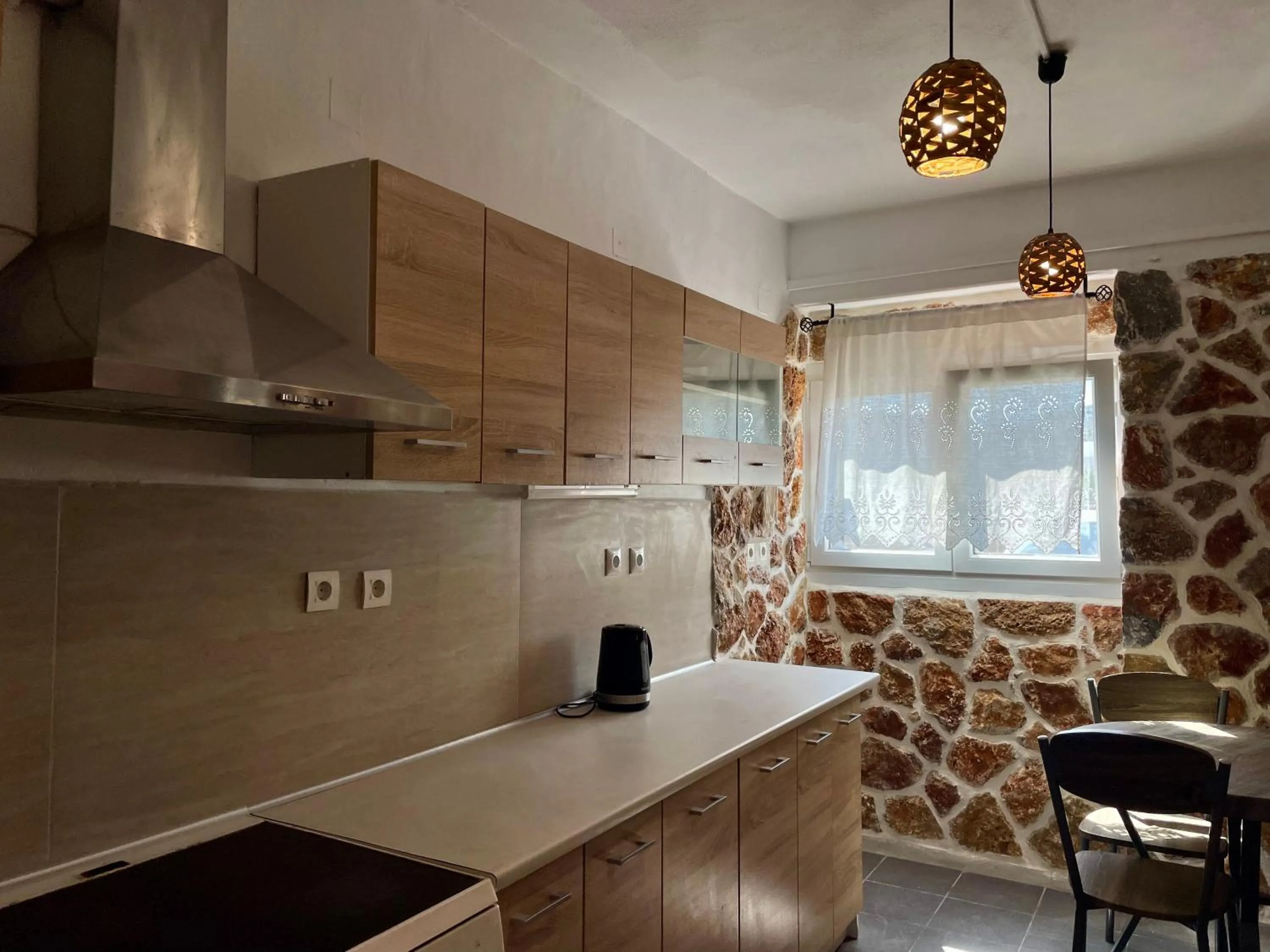Kitchen or kitchenette in Atlazia Suites