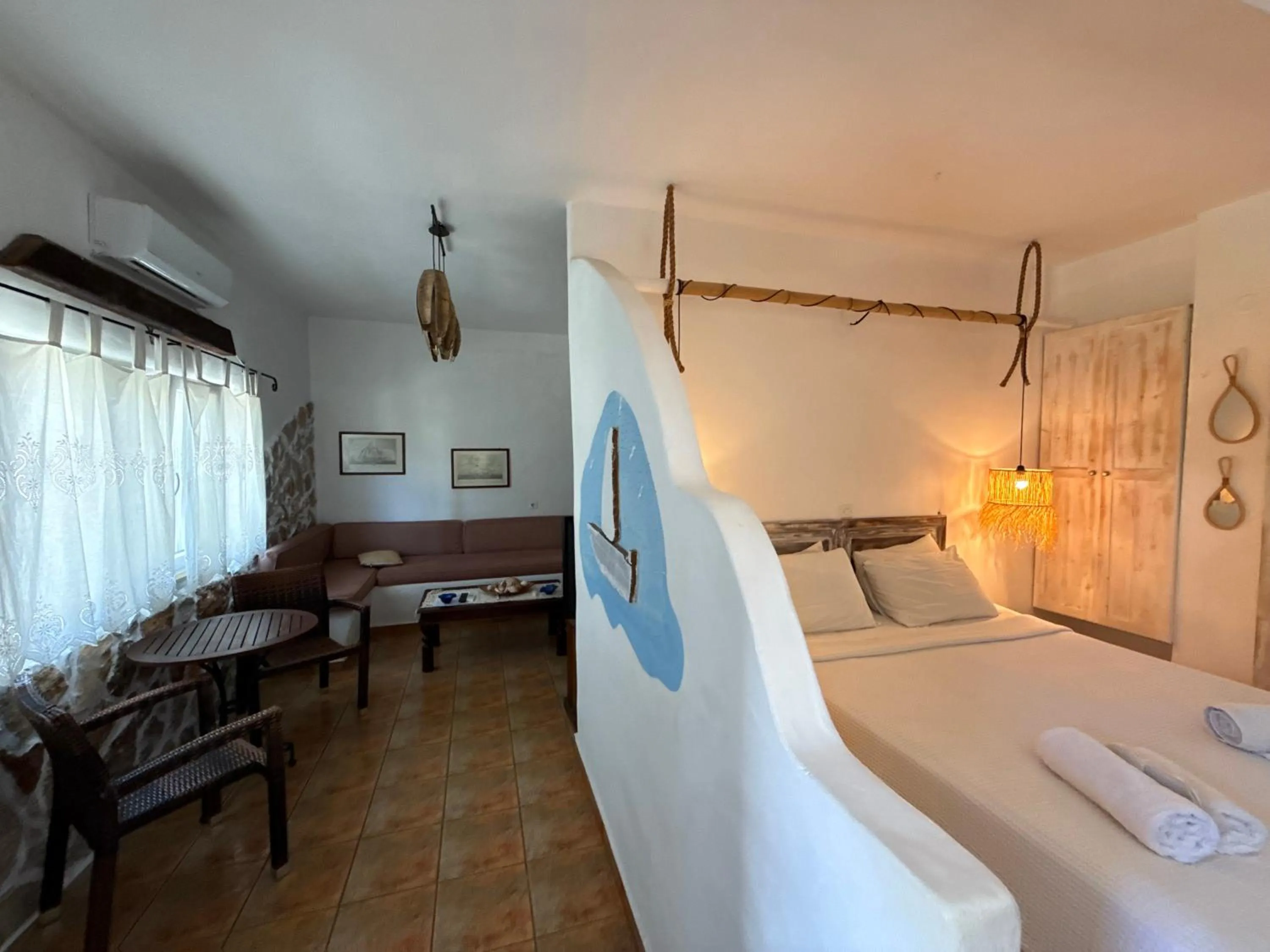 Bed in Atlazia Suites