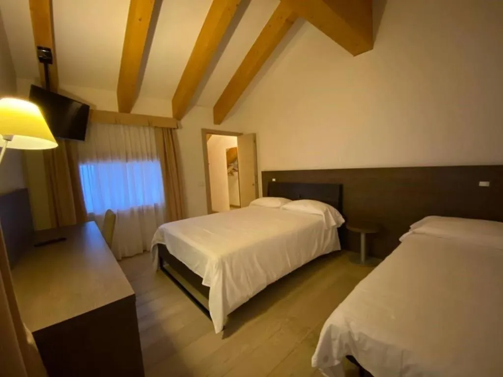 Bed in Grand Hotel Miramonti