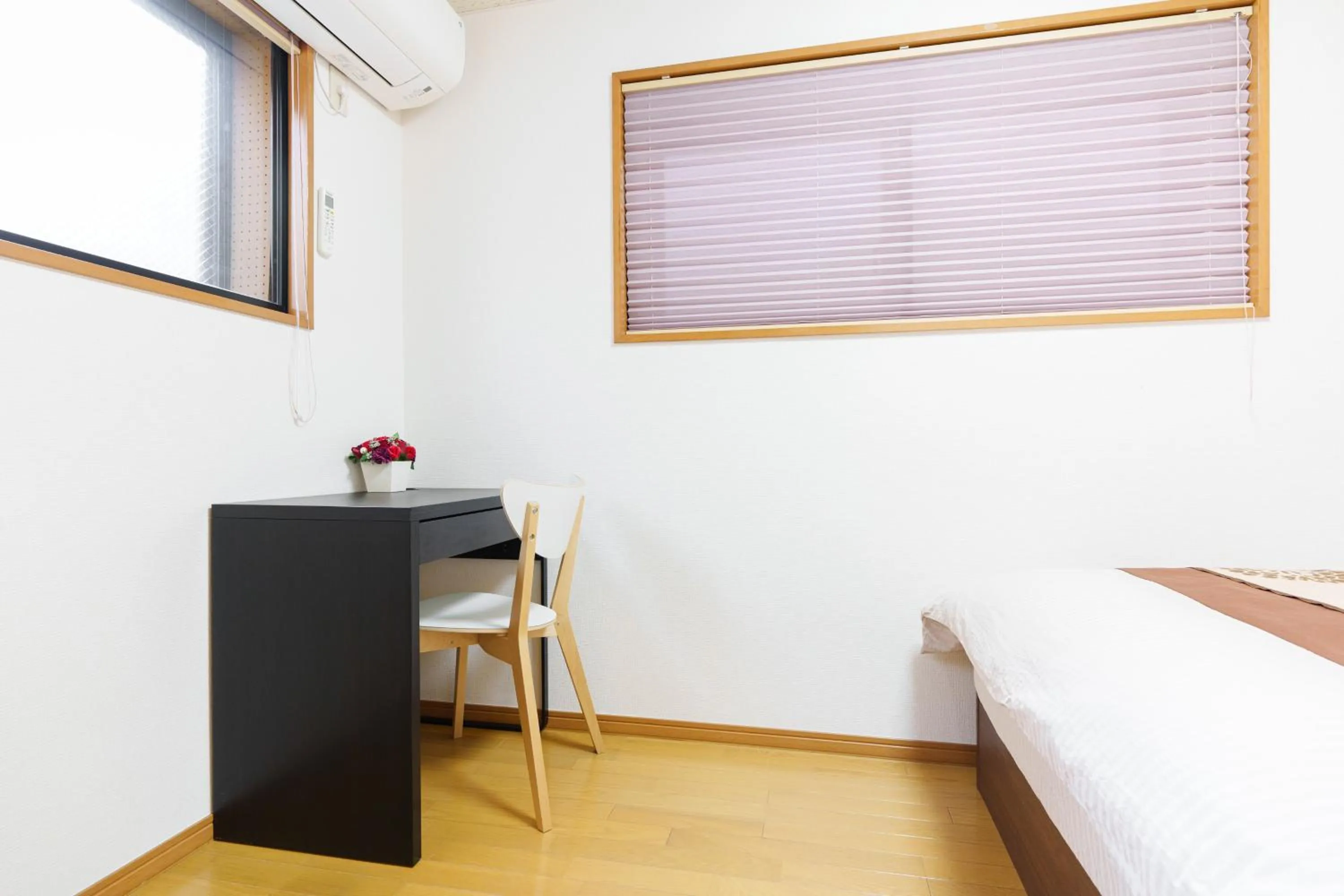 Bedroom, Bed in Luxury Guest House in Tokyo Shinjuku