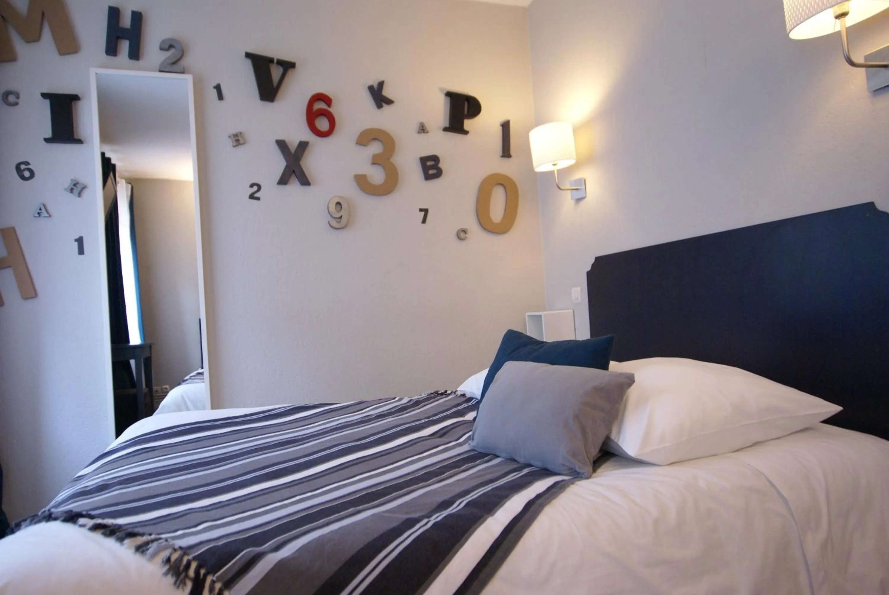 Bed in Hotel de la Placette Barcelonnette