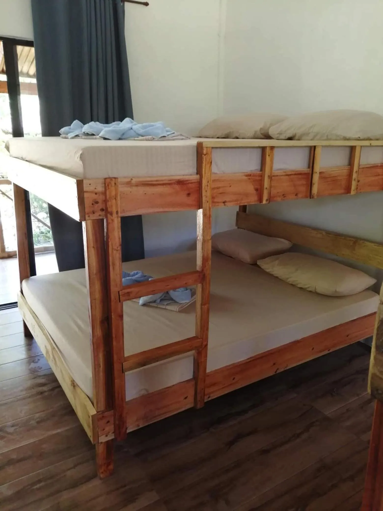 Bed in Big BamBoo Beach Resort Sipalay