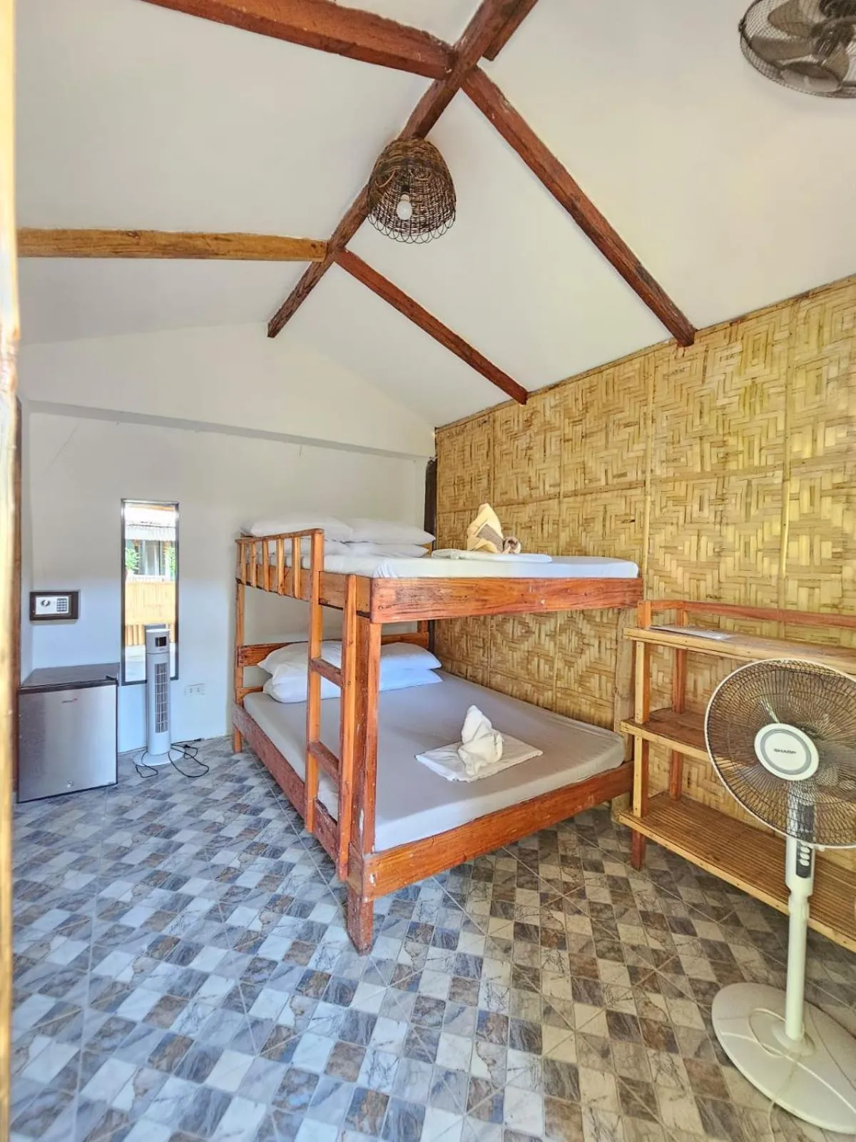 Bed in Big BamBoo Beach Resort Sipalay