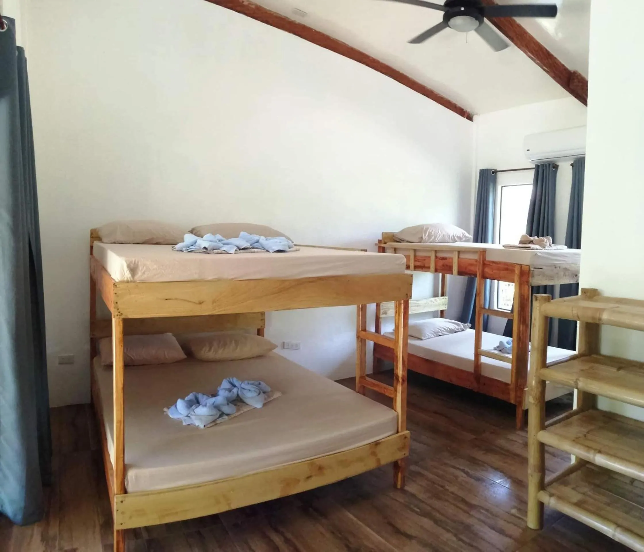 Bed in Big BamBoo Beach Resort Sipalay