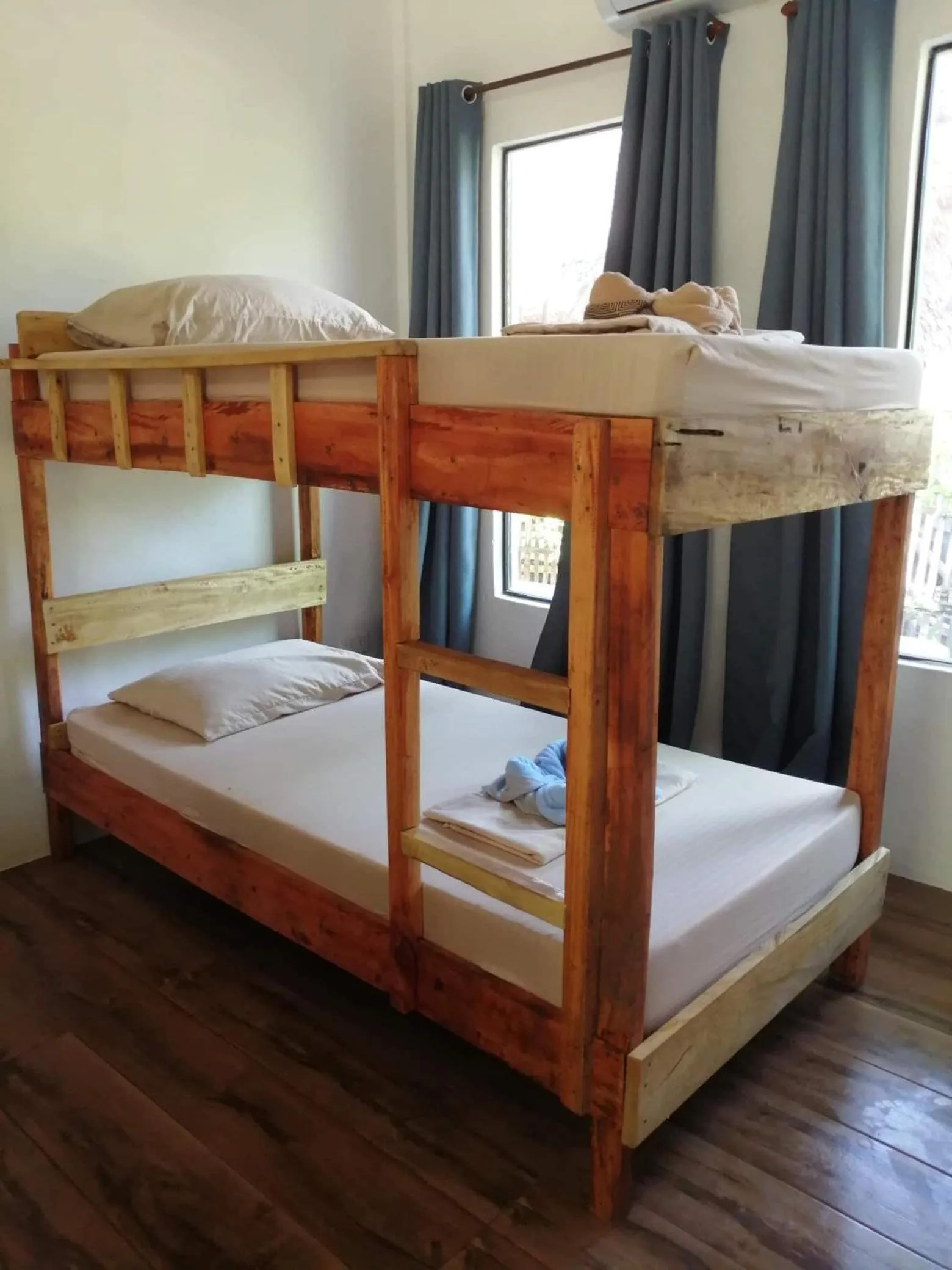 Bed in Big BamBoo Beach Resort Sipalay