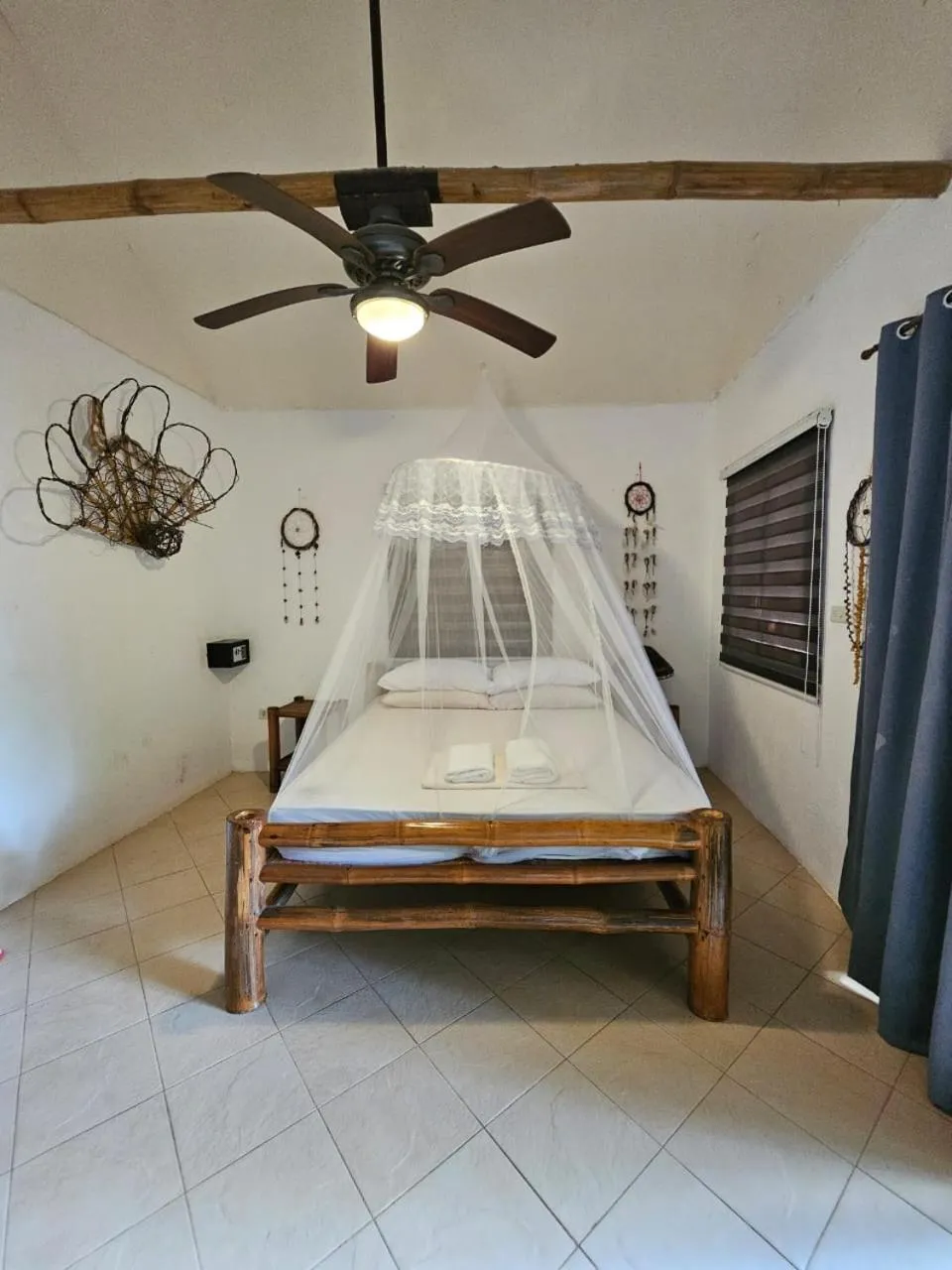 Bed in Big BamBoo Beach Resort Sipalay