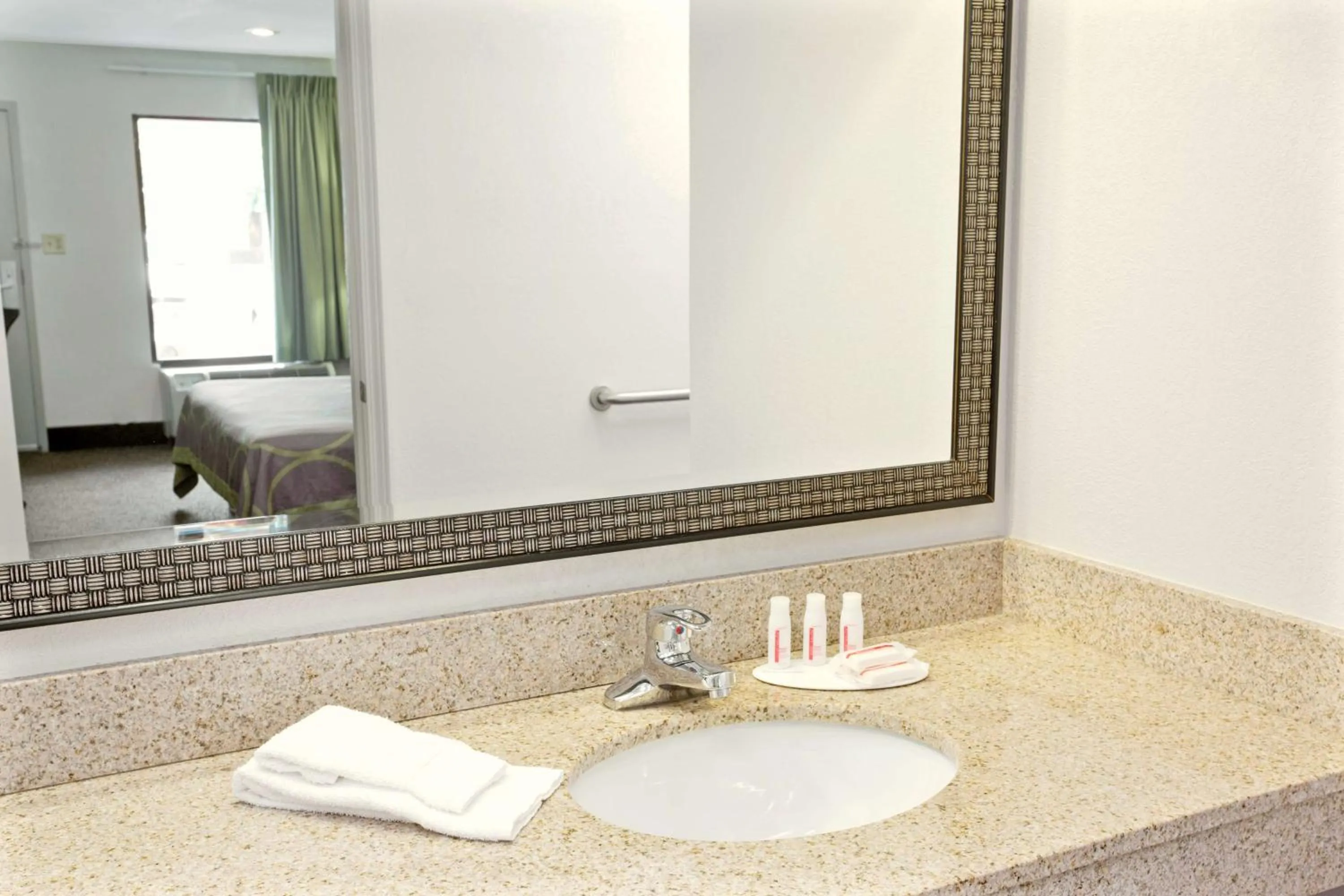 Bathroom in Super 8 by Wyndham Gainesville