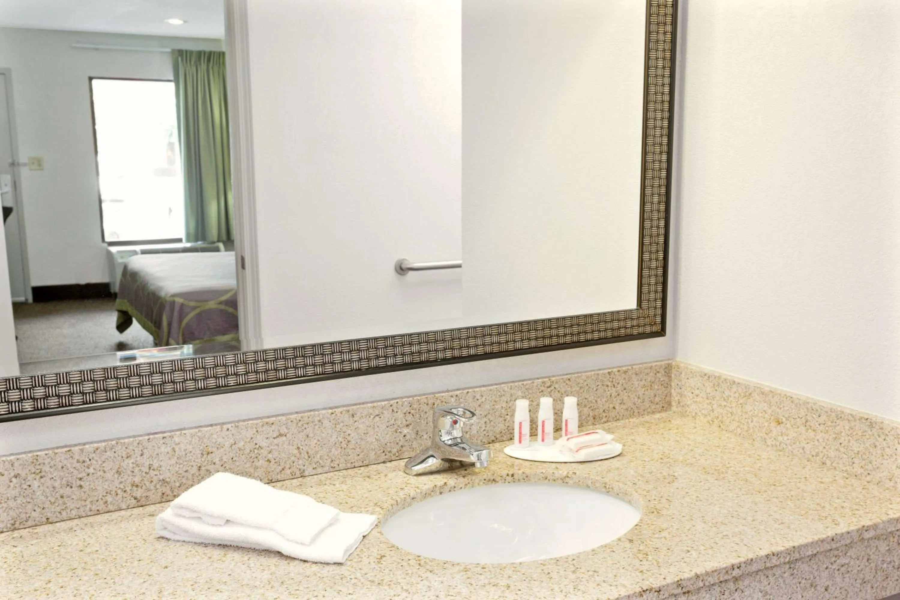 Bathroom in Super 8 by Wyndham Gainesville