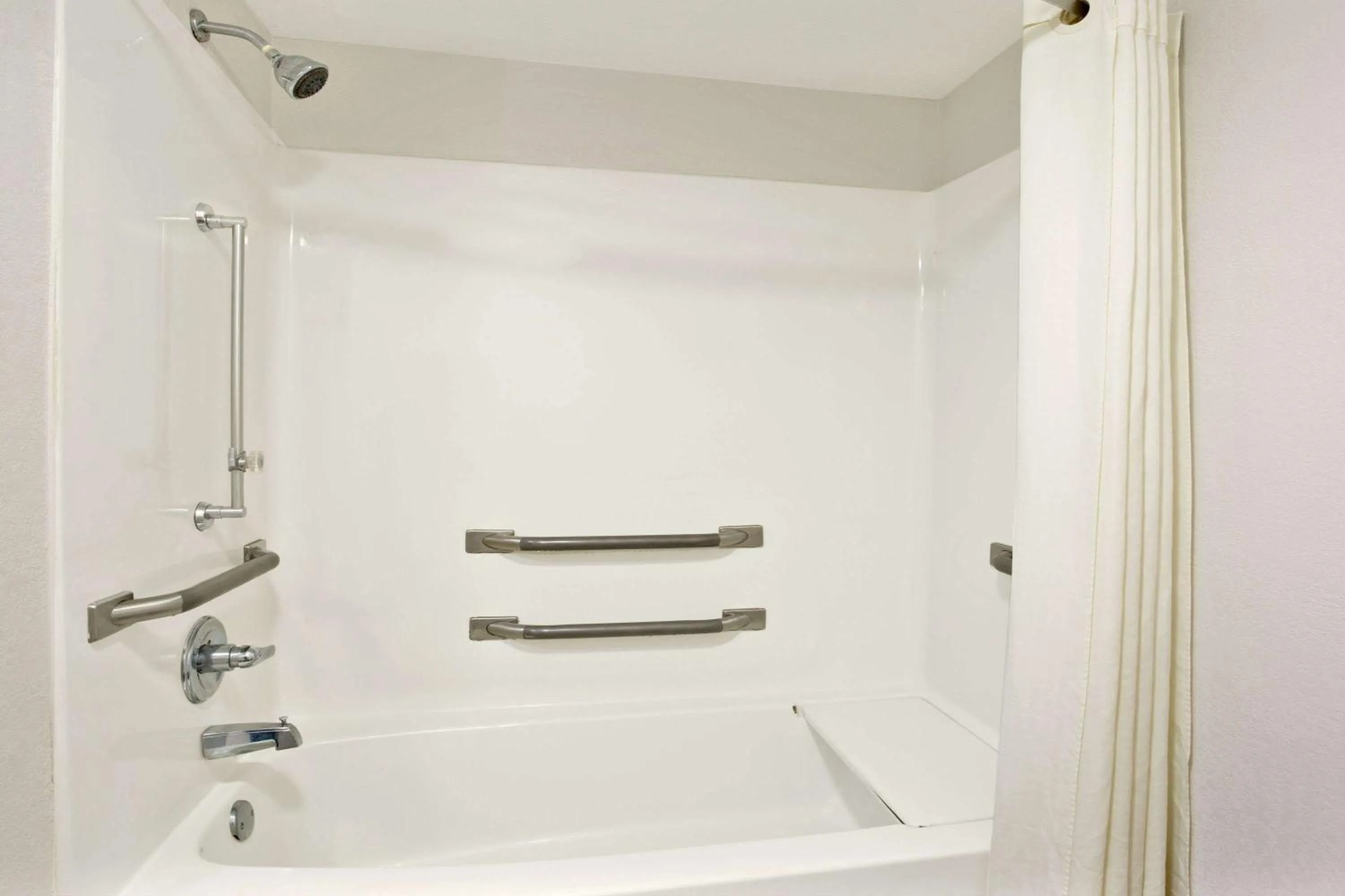 Bathroom in Super 8 by Wyndham Gainesville