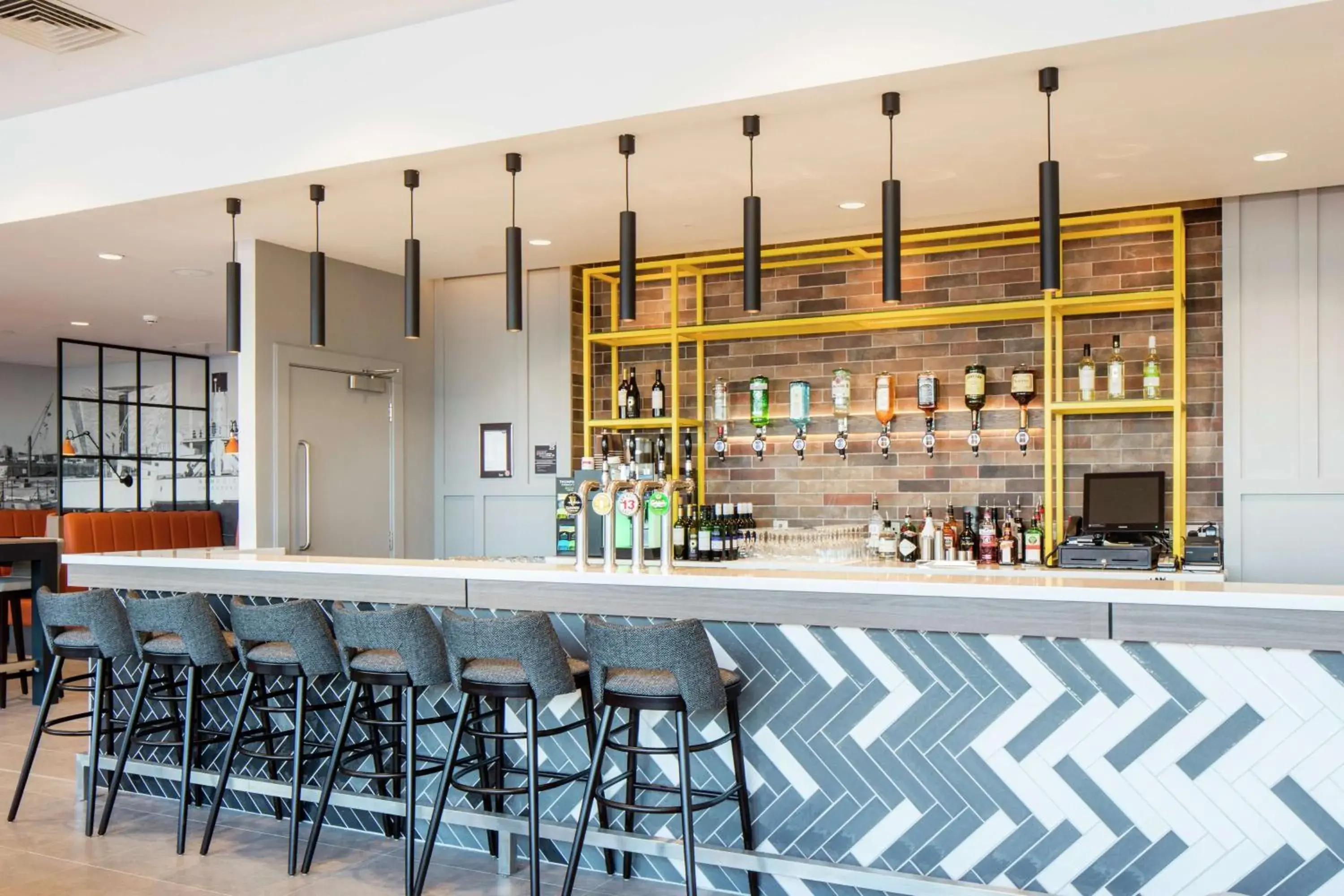 Lounge or bar in Hampton By Hilton Belfast City Centre Lounge or bar in Hampton By Hilton Belfast City Centre