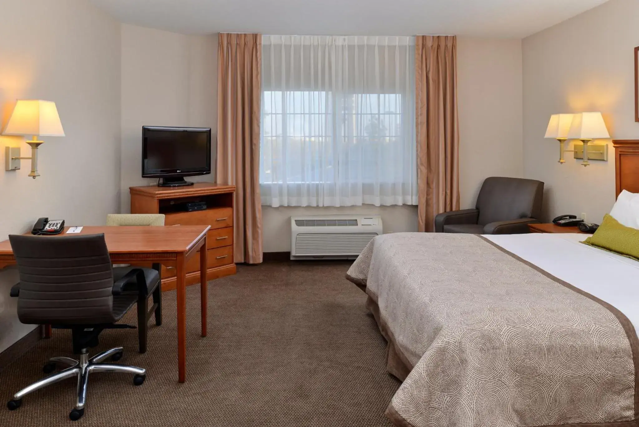 Photo of the whole room, Bed in Candlewood Suites Turlock by IHG Photo of the whole room, Bed in Candlewood Suites Turlock by IHG