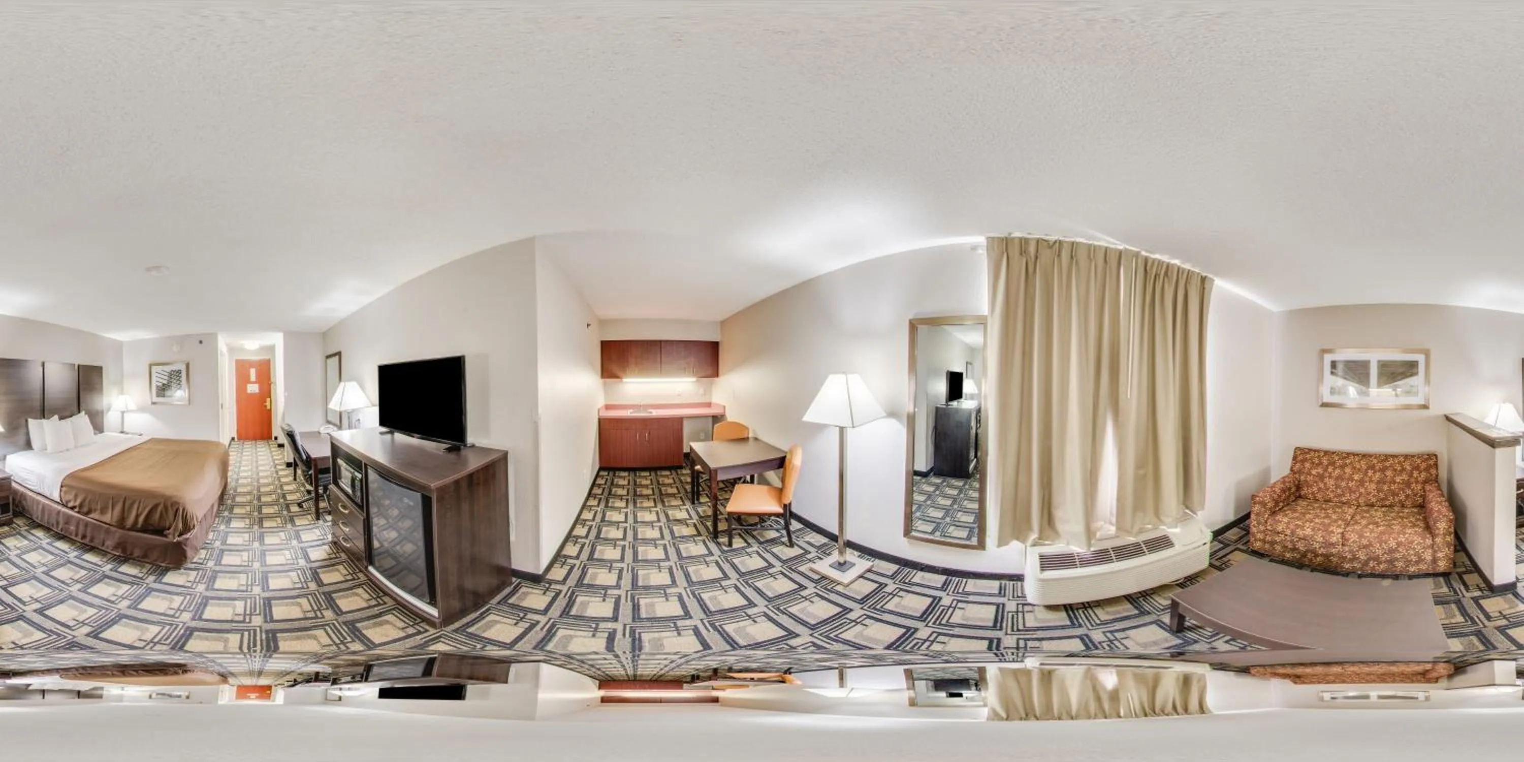 Kitchen or kitchenette, Bed in Suburban Studios Mason Hwy 42