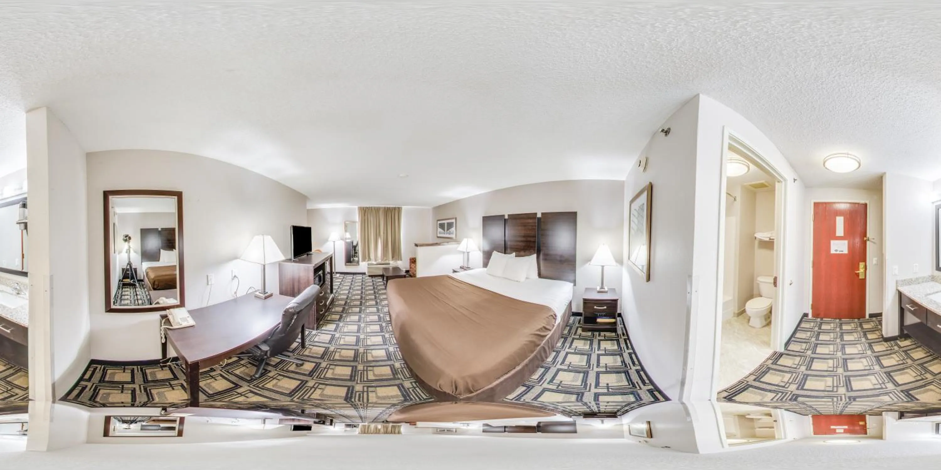 Kitchen or kitchenette, Bed in Suburban Studios Mason Hwy 42