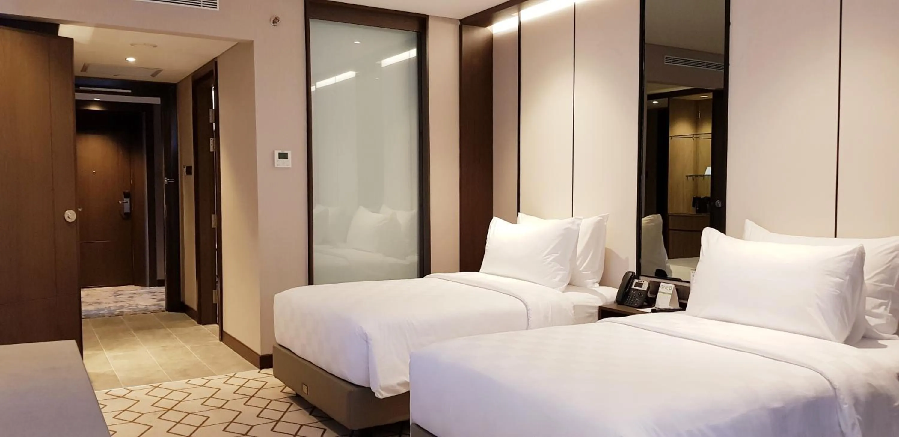 Bed in Wyndham Opi Hotel Palembang