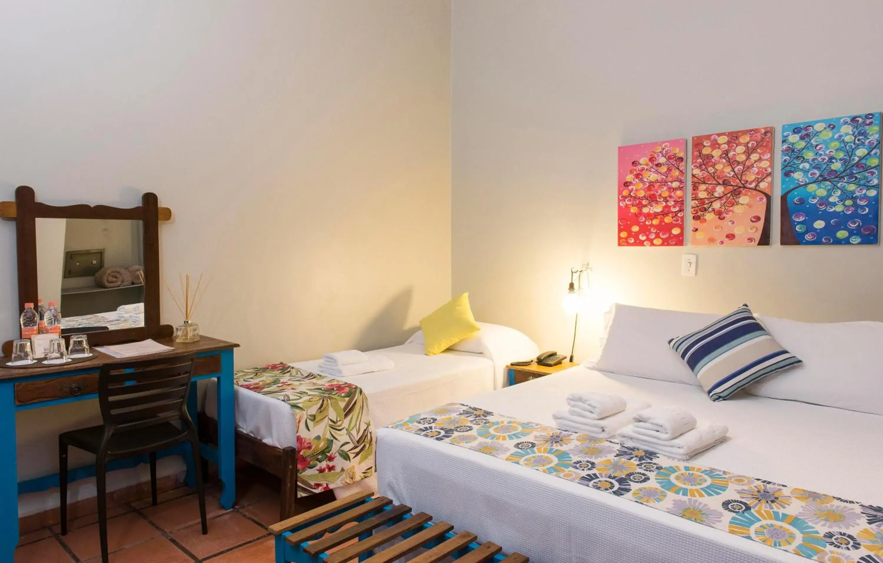 Triple Room with Mountain View in Hotel Porto Di Mare Triple Room with Mountain View in Hotel Porto Di Mare