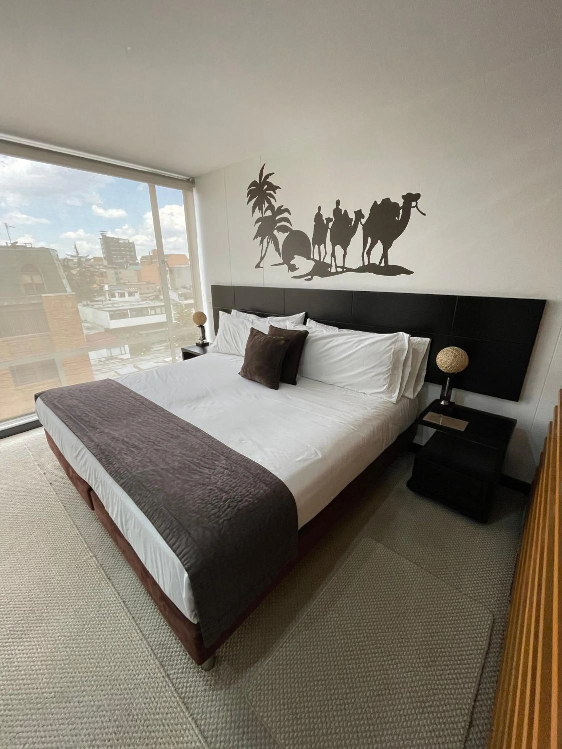 Bed in Hotel Regency Suites La Feria