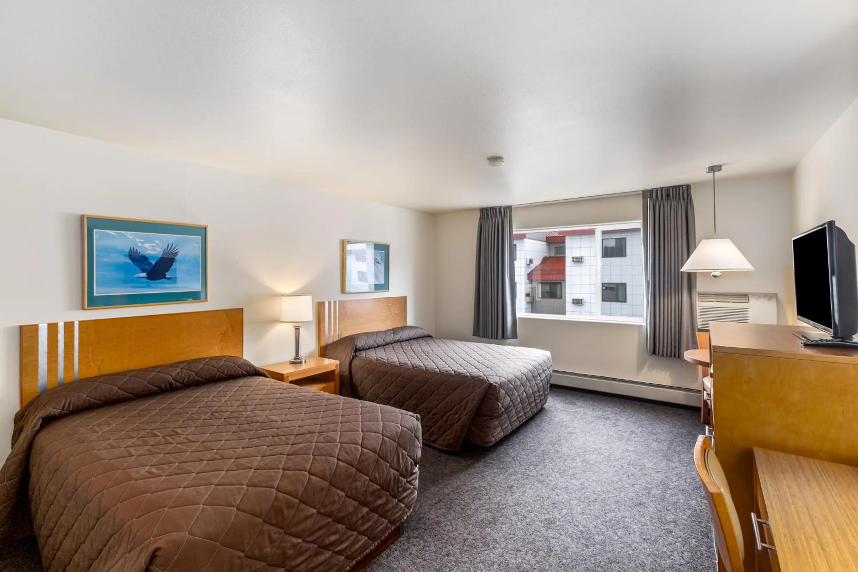 Bed in Breeze Inn Hotel & Motel