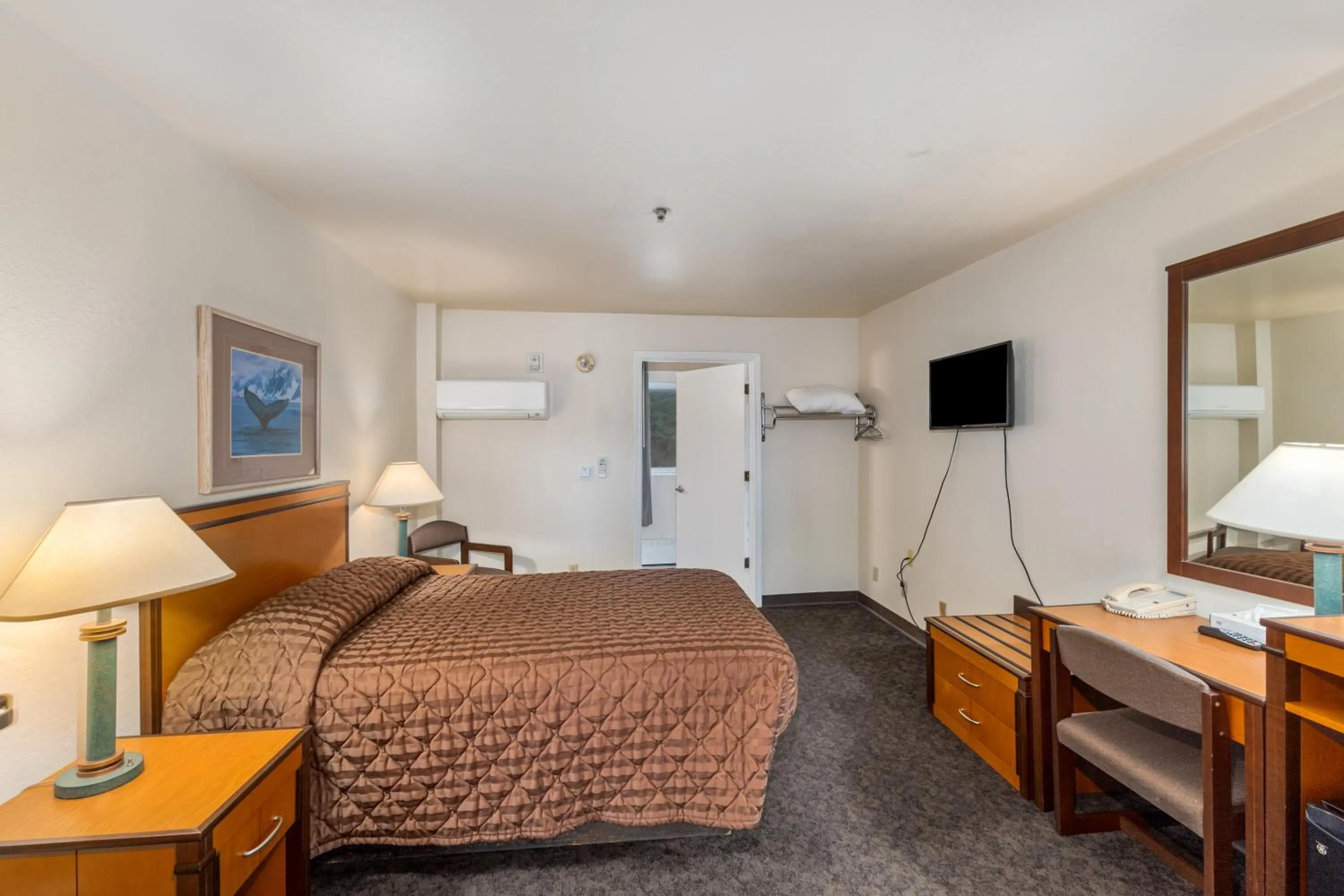 Bed in Breeze Inn Hotel & Motel