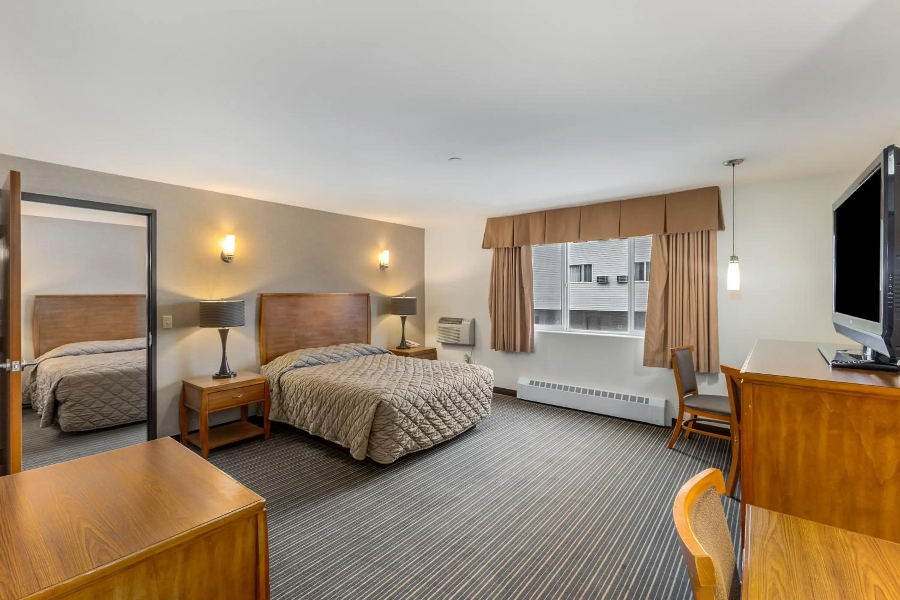 Bed in Breeze Inn Hotel & Motel