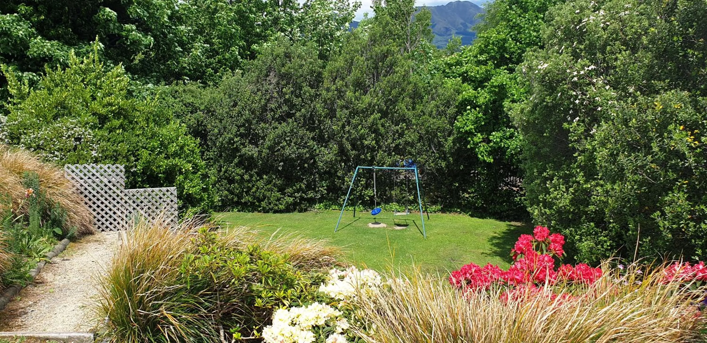Children play ground in Alpine Garden Motel