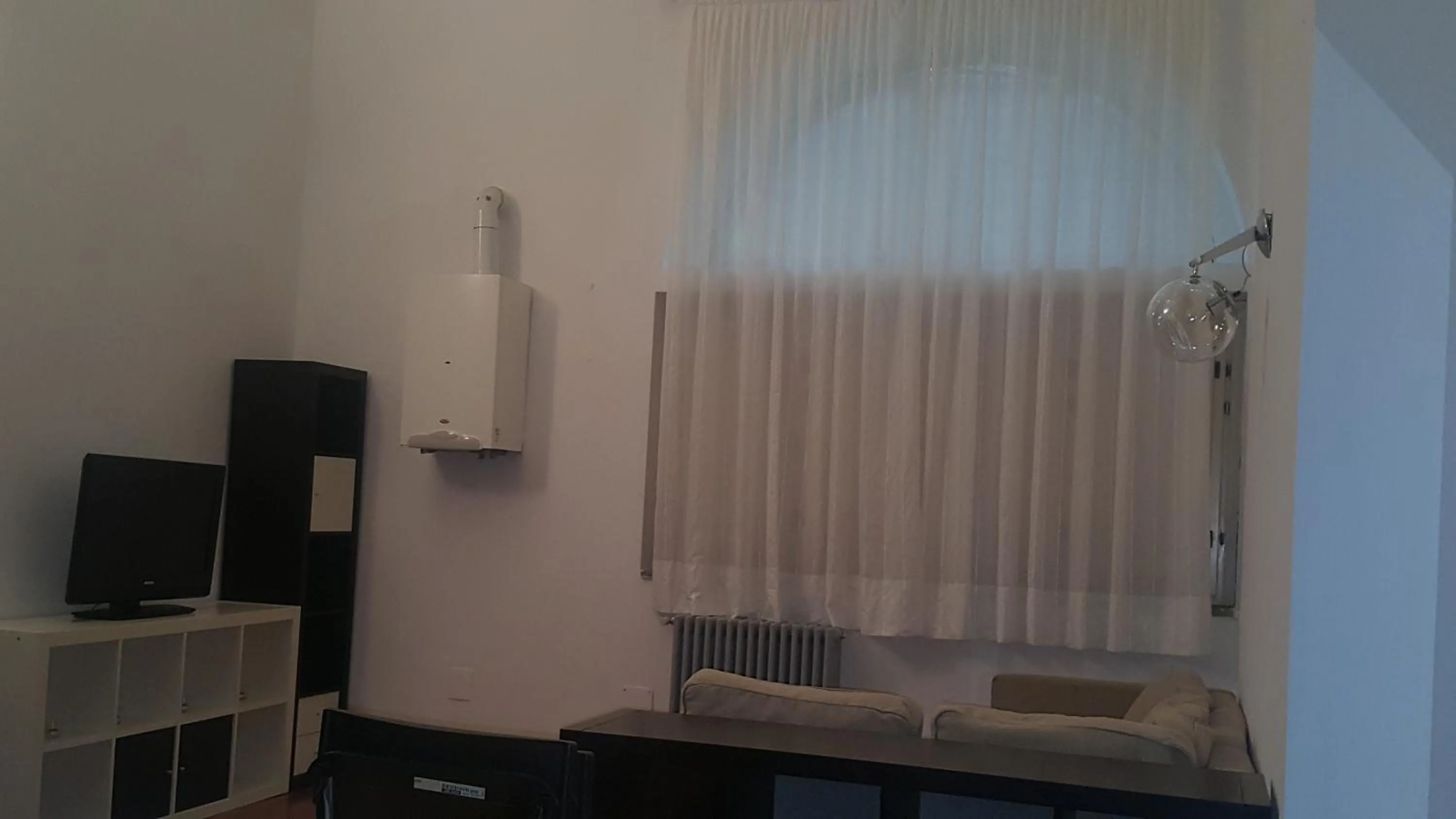 Communal lounge/ TV room in Apartaments Sonnino