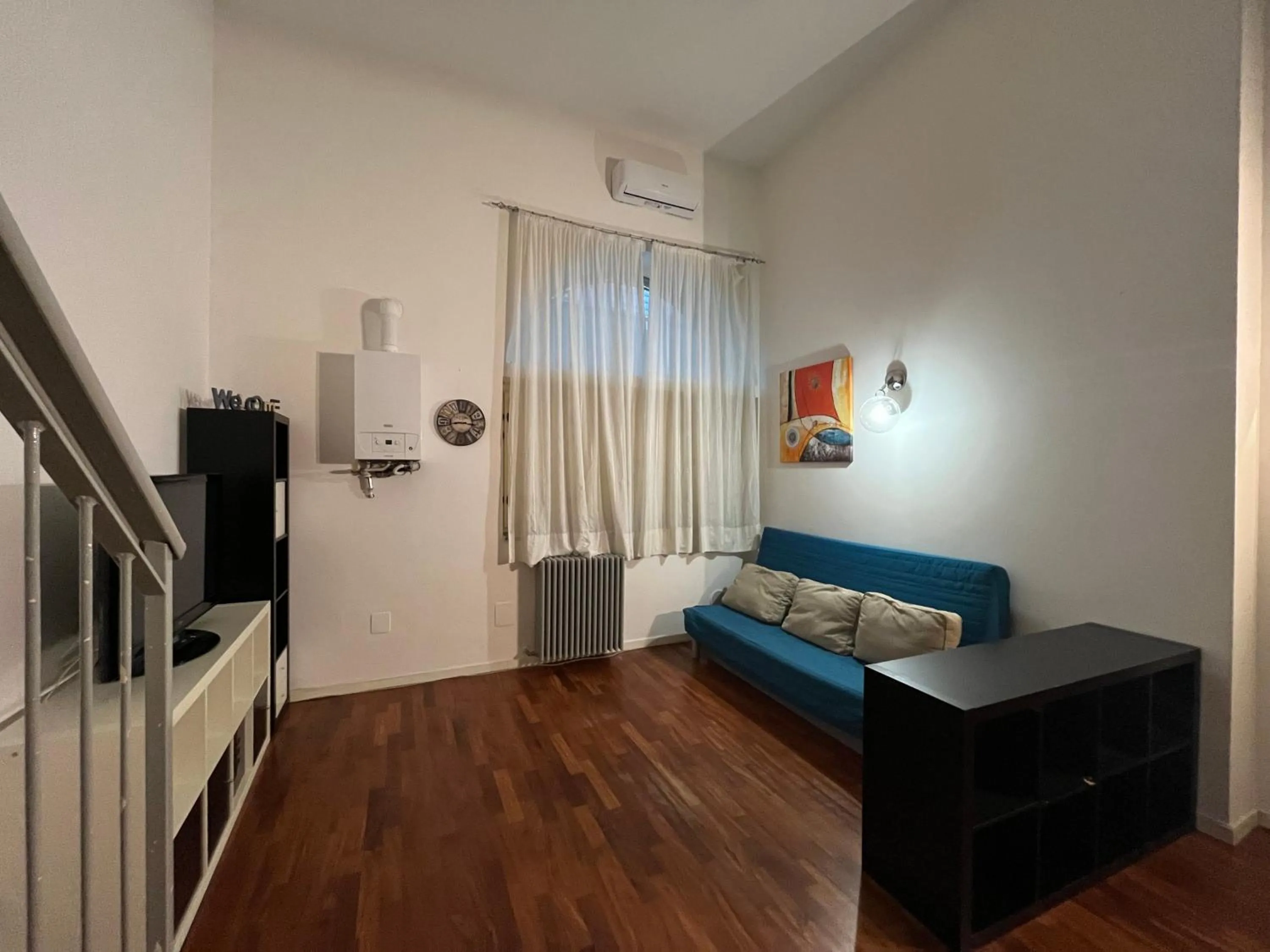 Communal lounge/ TV room, Bed in Apartaments Sonnino