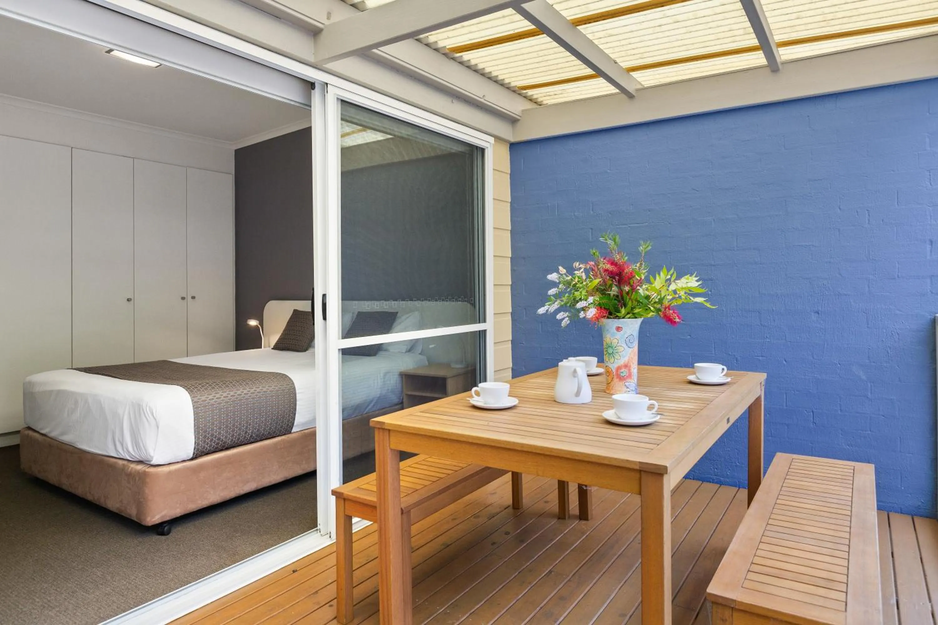 Bed in Tathra Beach House Holiday Apartments