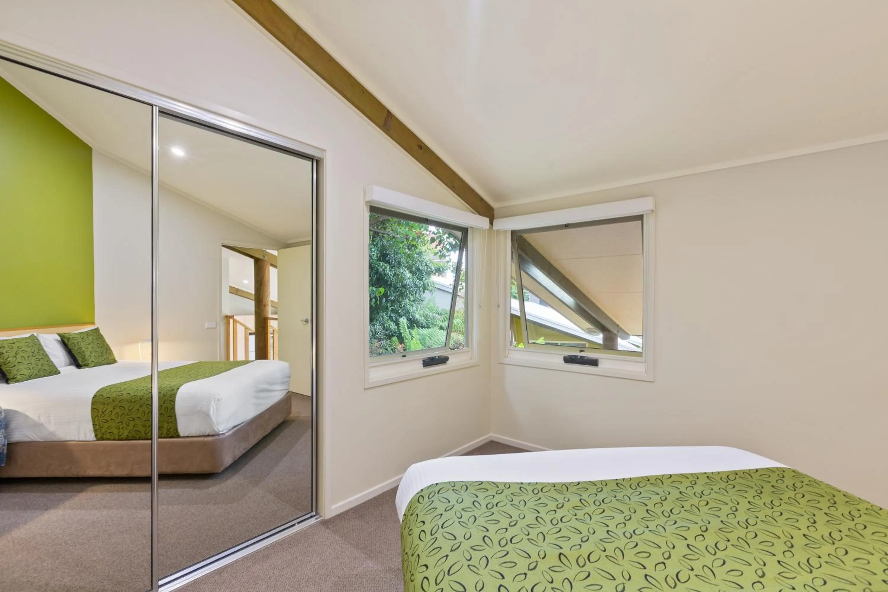 Bed in Tathra Beach House Holiday Apartments