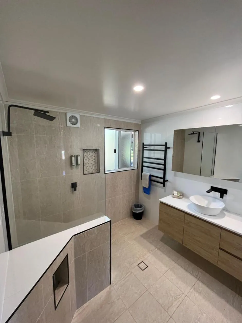 Shower in Tathra Beach House Holiday Apartments
