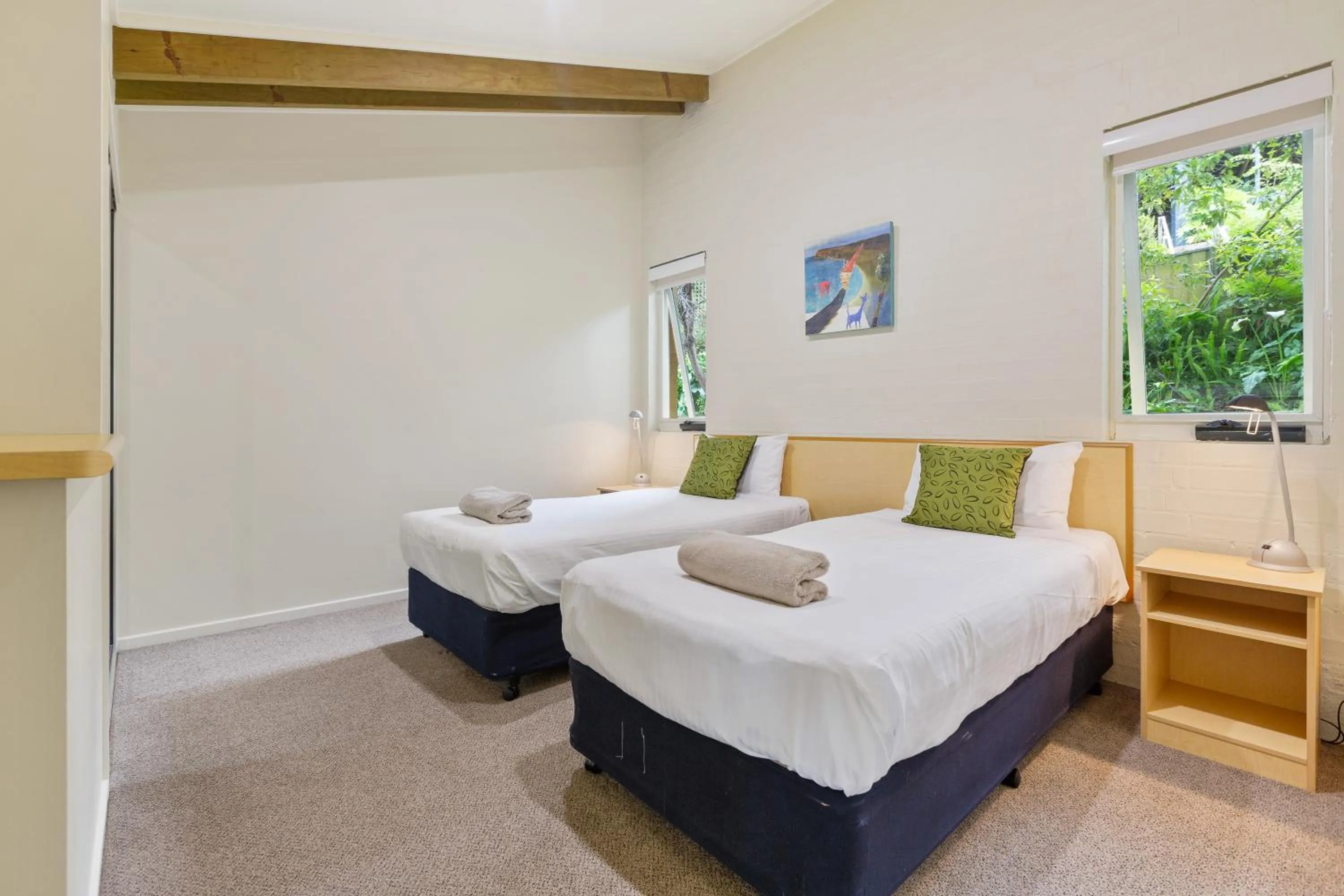 Bed in Tathra Beach House Holiday Apartments