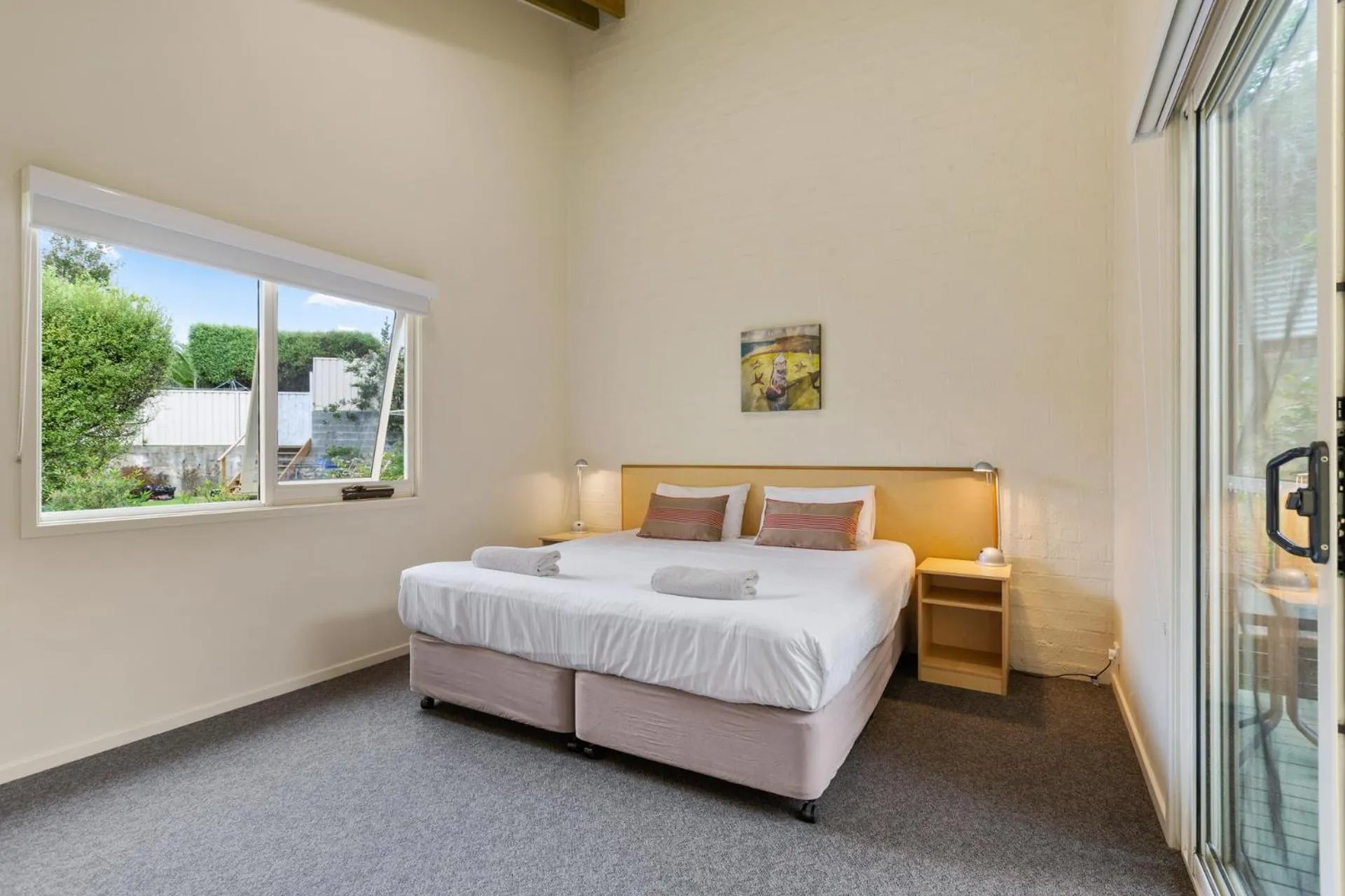 Bed in Tathra Beach House Holiday Apartments