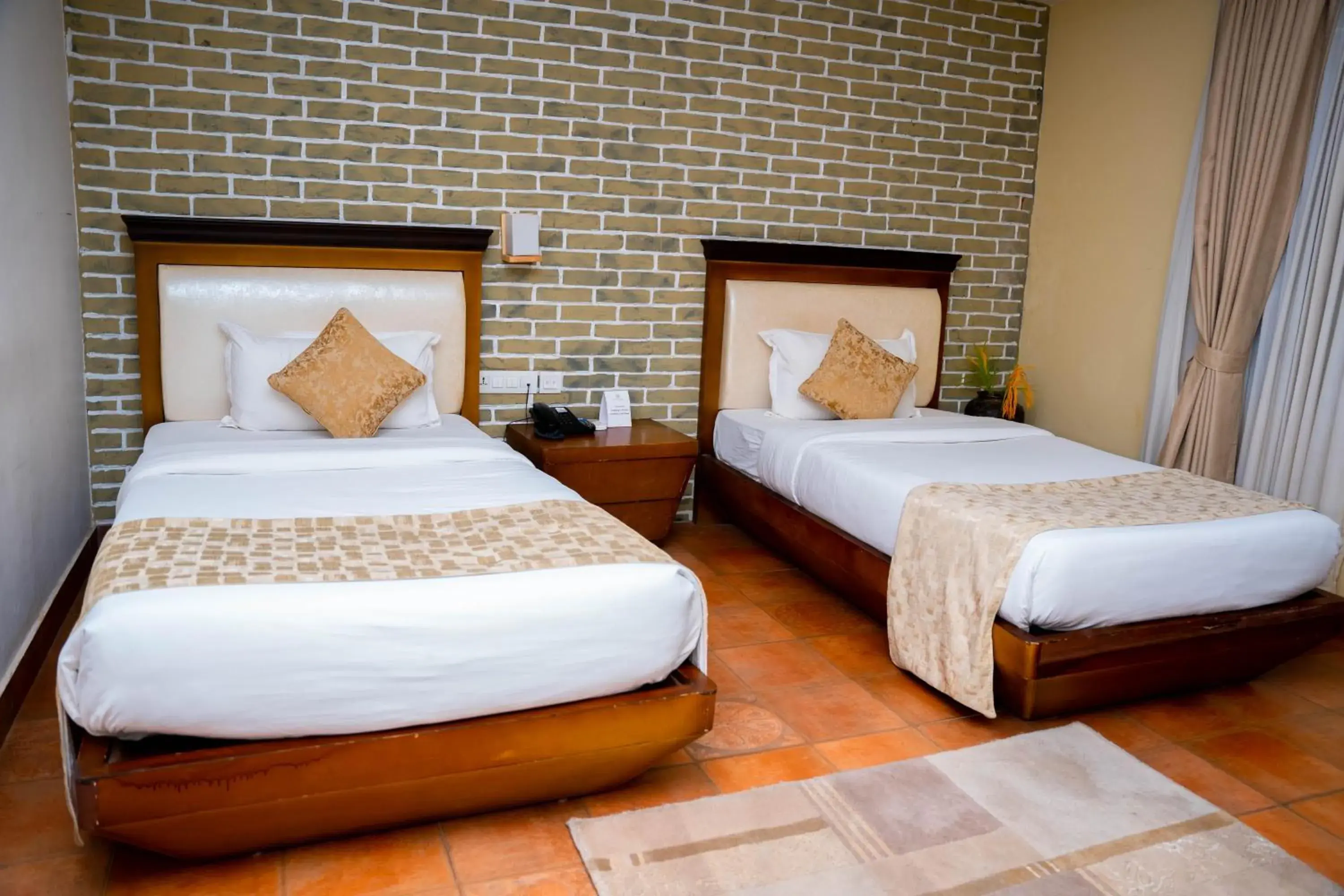 Bed in Teeka Resort Suites & Spa Bed in Teeka Resort Suites & Spa