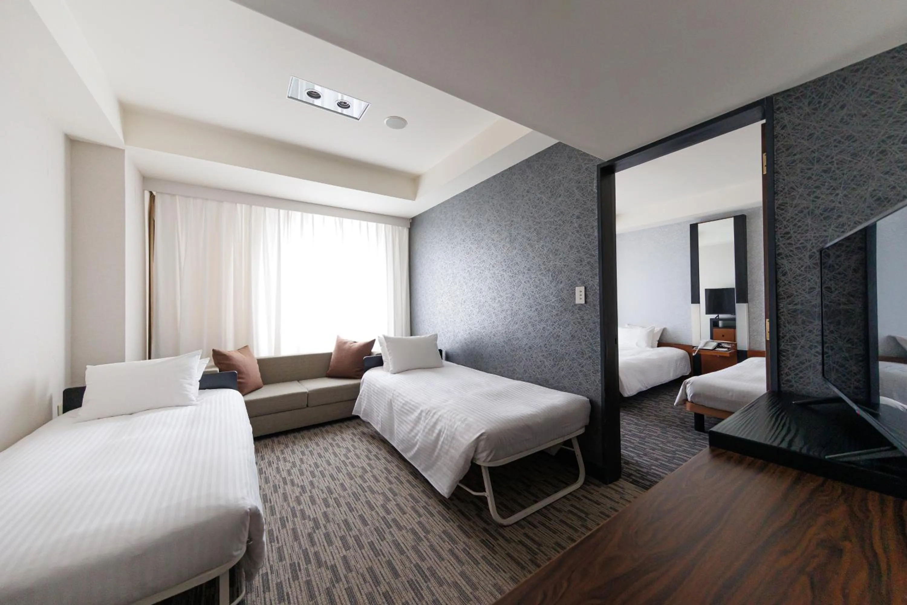 Bed in Kokusai 21 International Hotel