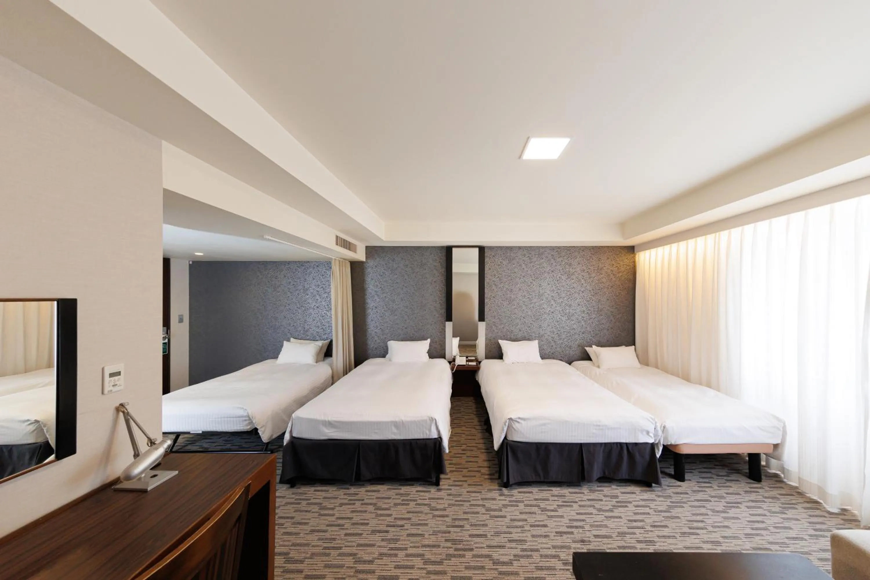 Bed in Kokusai 21 International Hotel