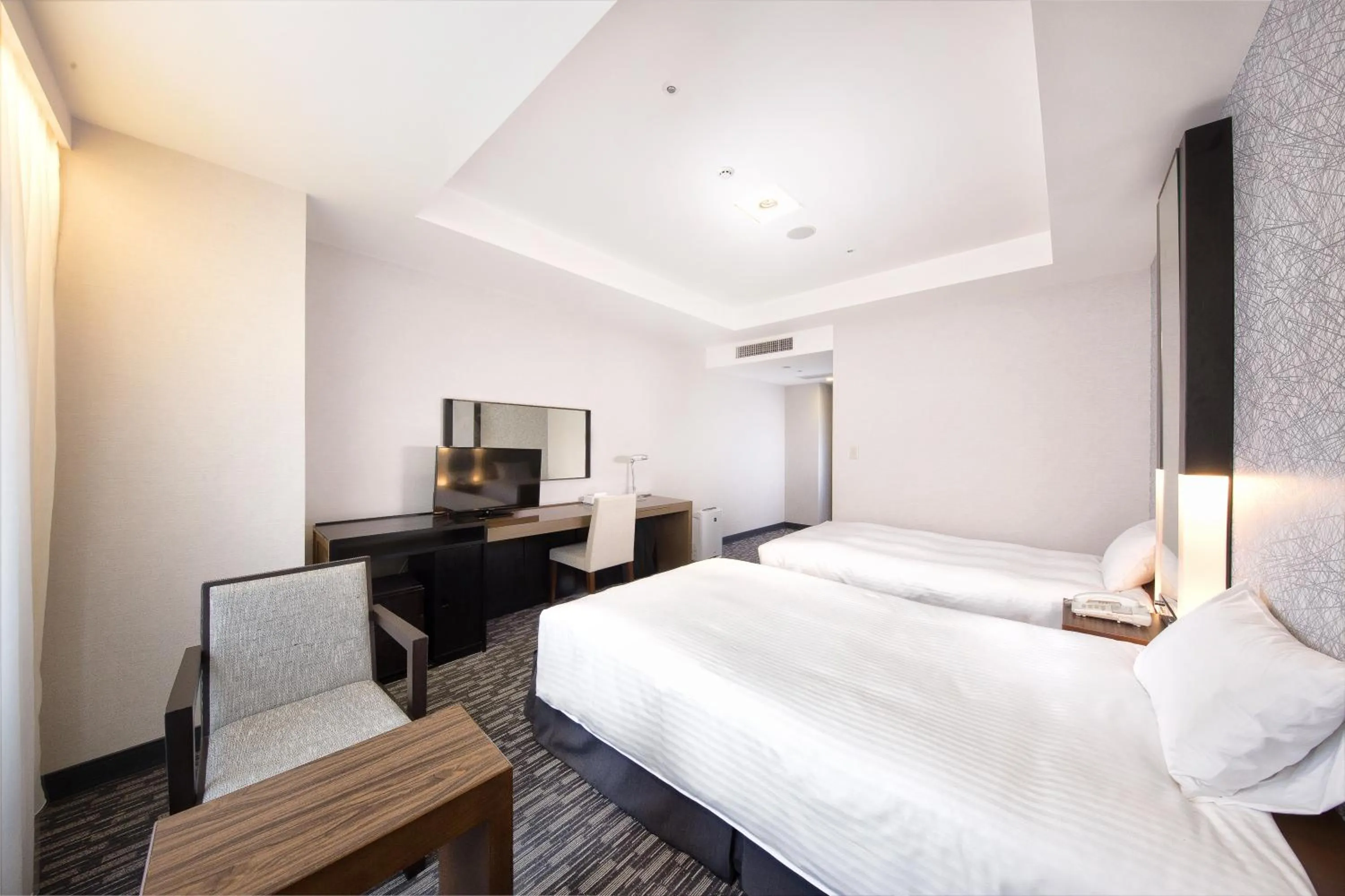 Bed in Kokusai 21 International Hotel