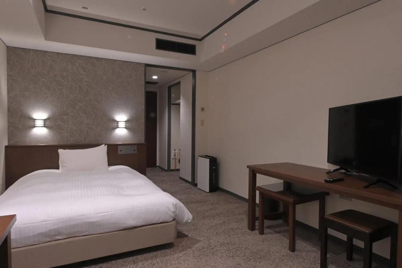 Bed in Kokusai 21 International Hotel