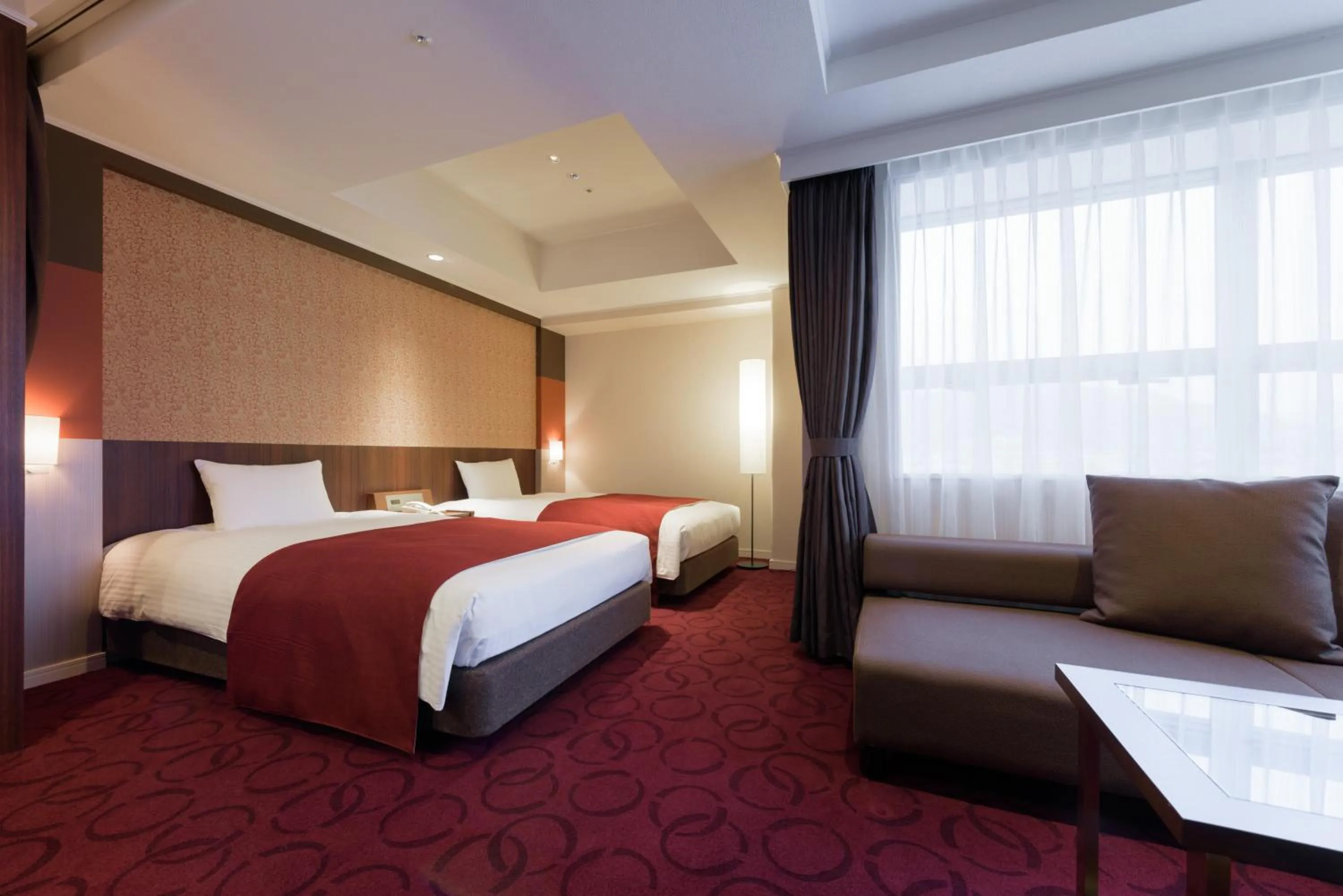 Bed in Kokusai 21 International Hotel