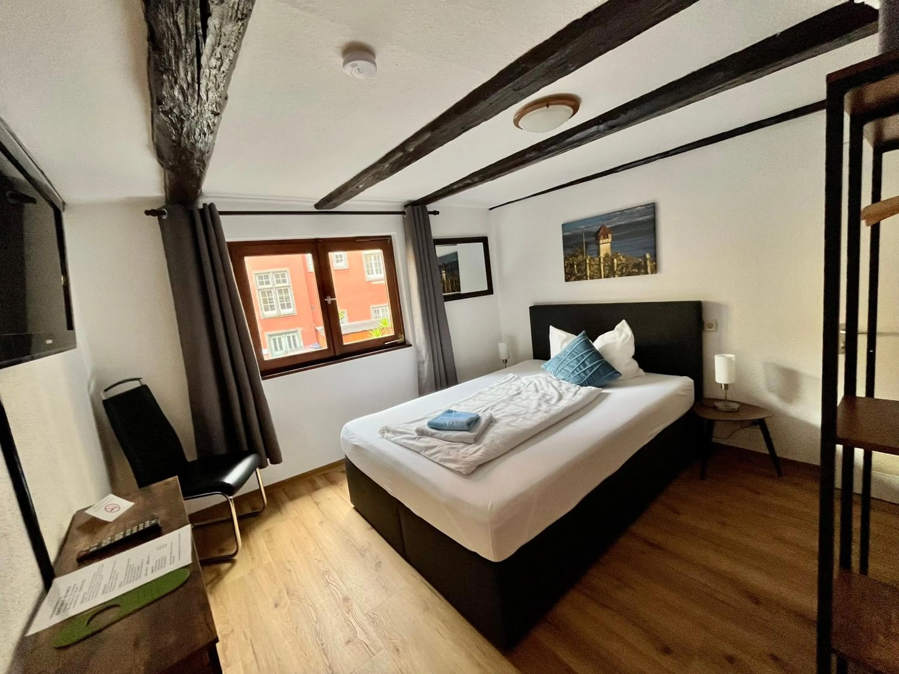 Photo of the whole room, Bed in Gästehaus AM HAFEN