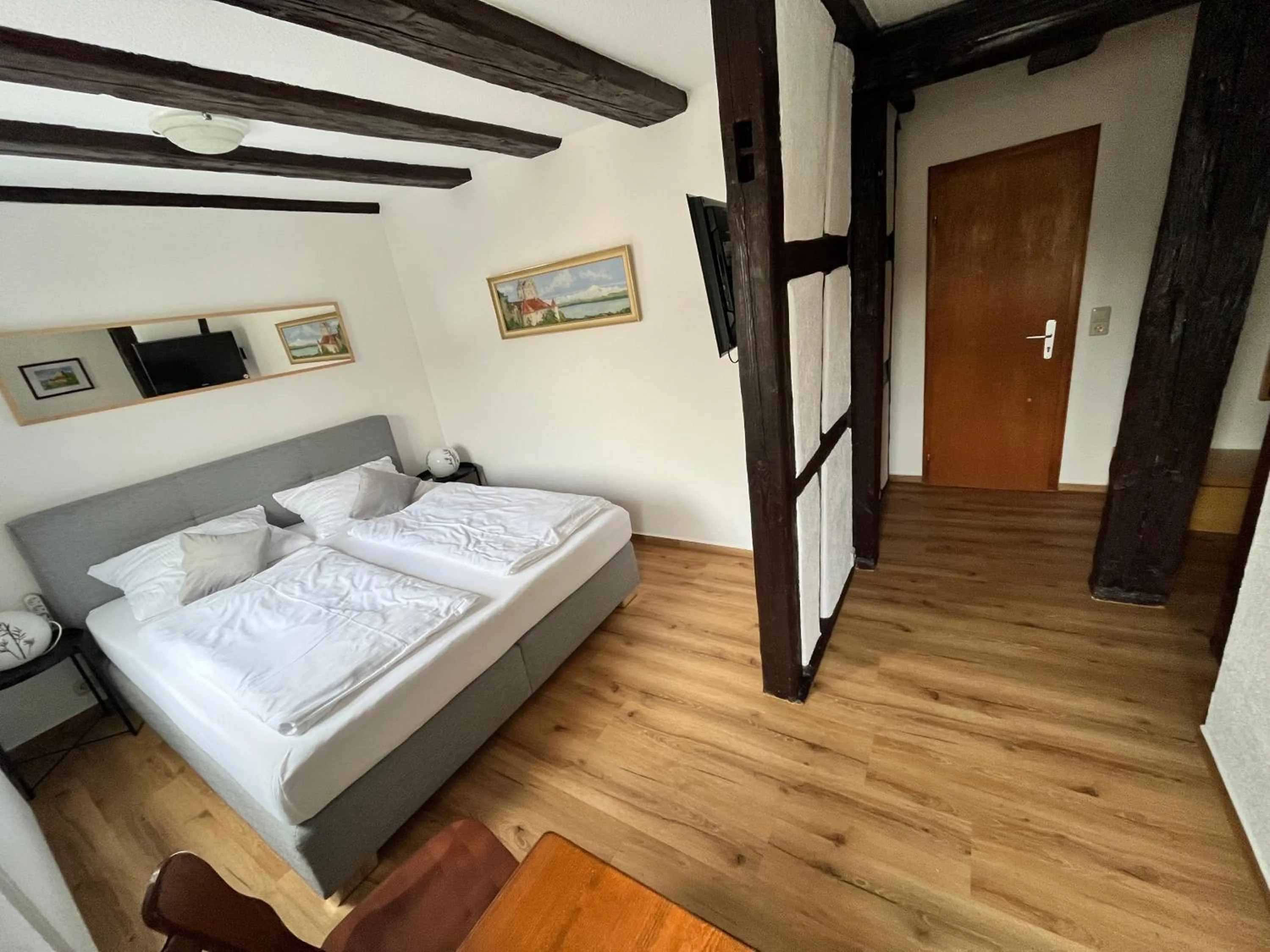 Photo of the whole room, Bed in Gästehaus AM HAFEN