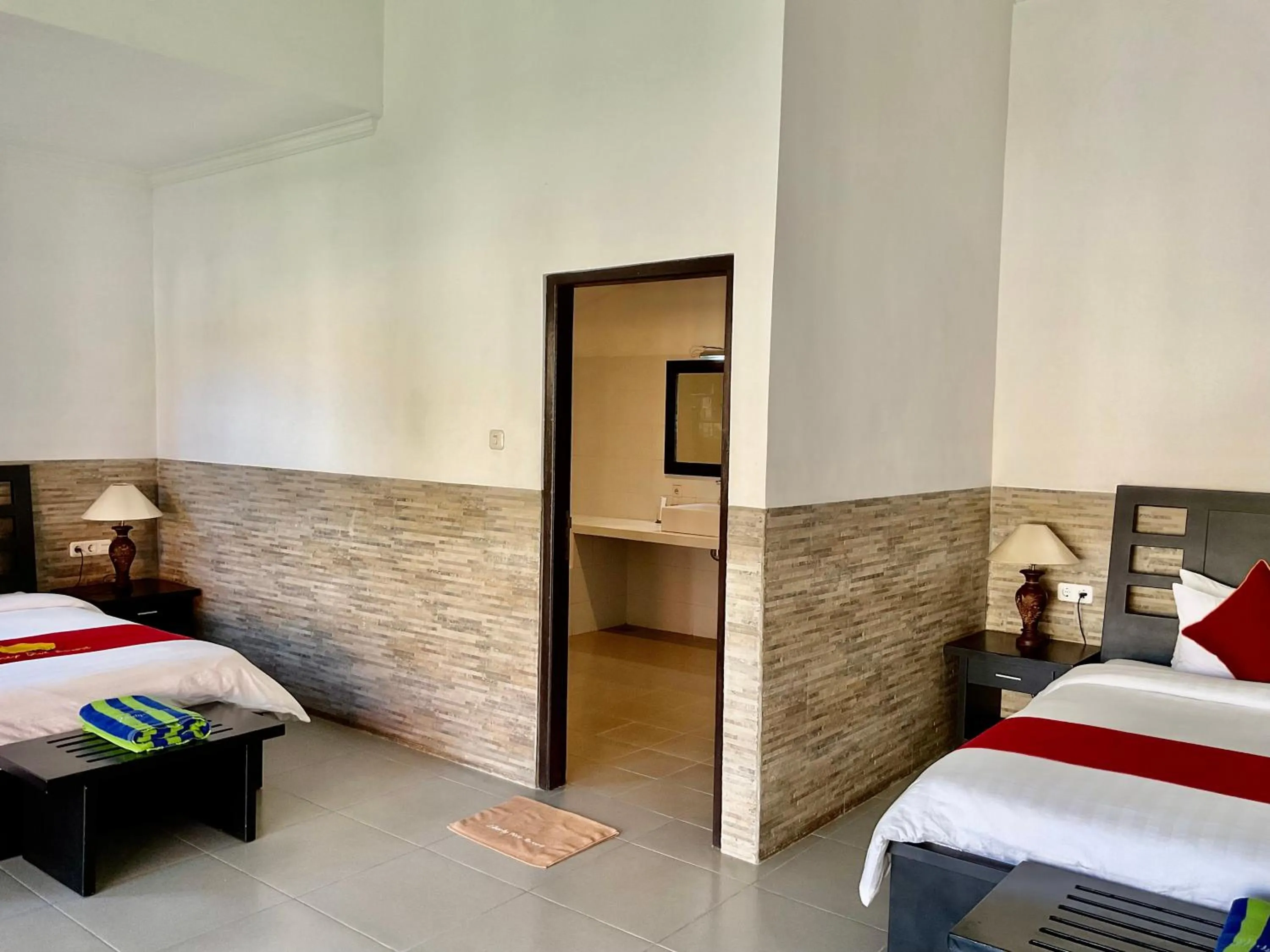 Bed in Liberty Dive Resort