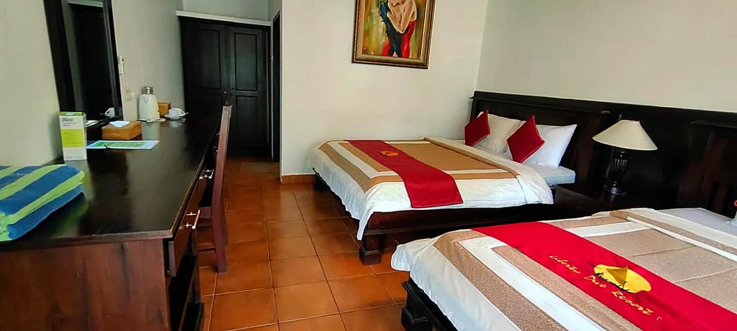 Bed in Liberty Dive Resort