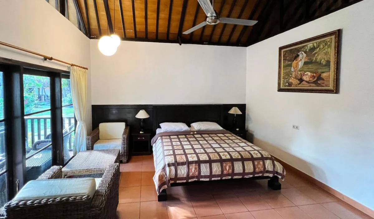 Bed in Liberty Dive Resort