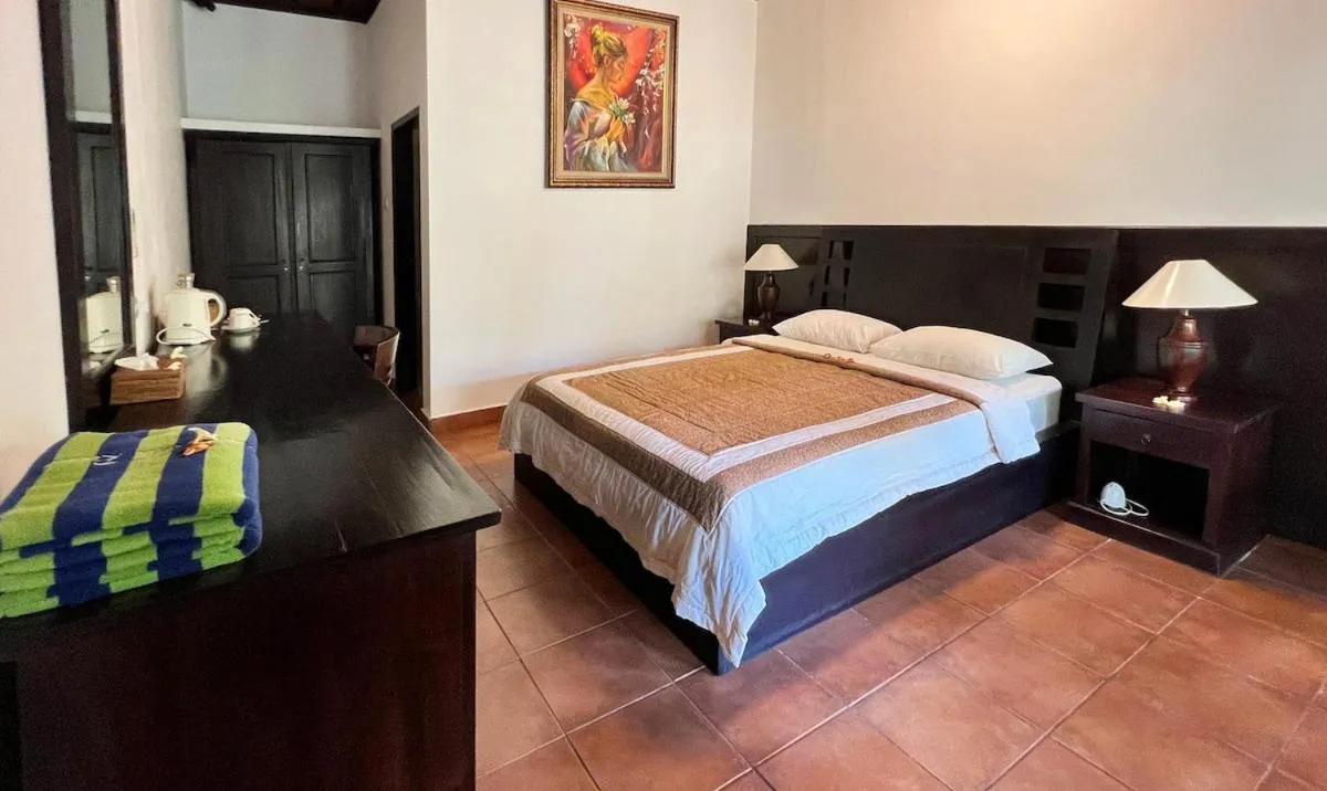 Bed in Liberty Dive Resort