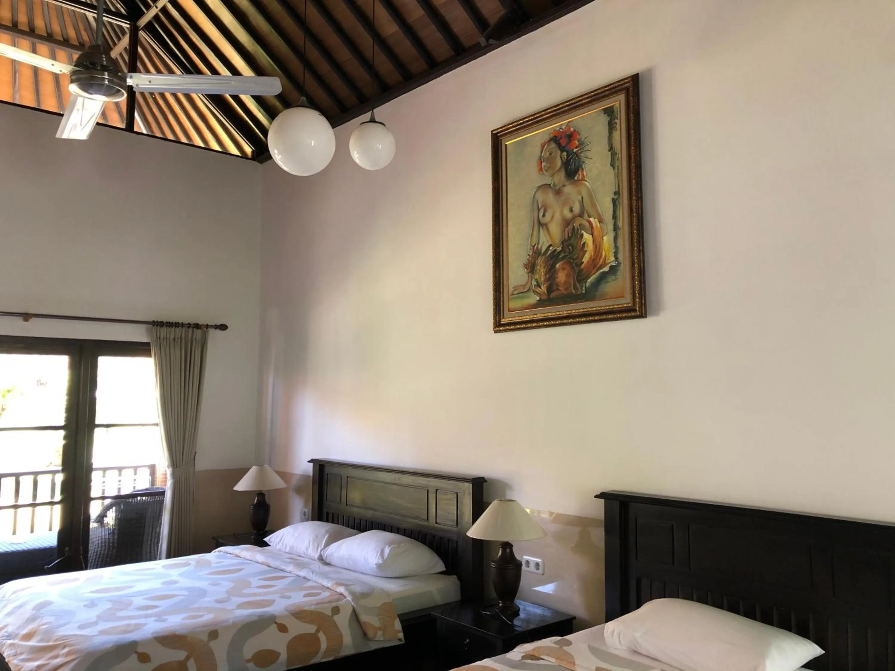 Bed in Liberty Dive Resort